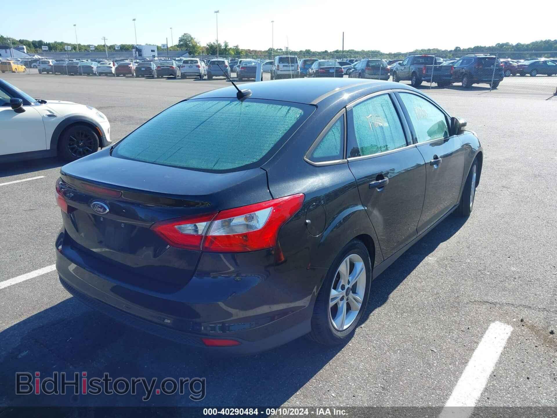 2014 FORD FOCUS - VIN: 1FADP3F21EL344049 - Photo 4