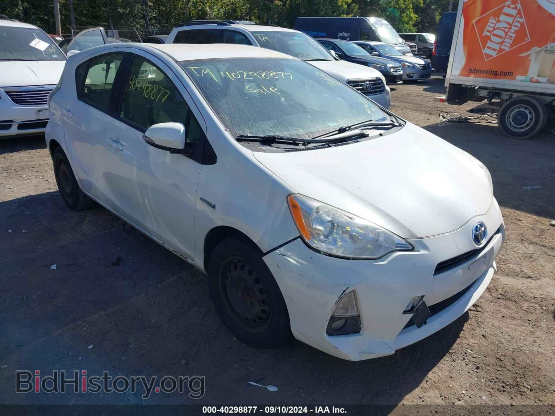 Фотография JTDKDTB30E1059153 - TOYOTA PRIUS C 2014