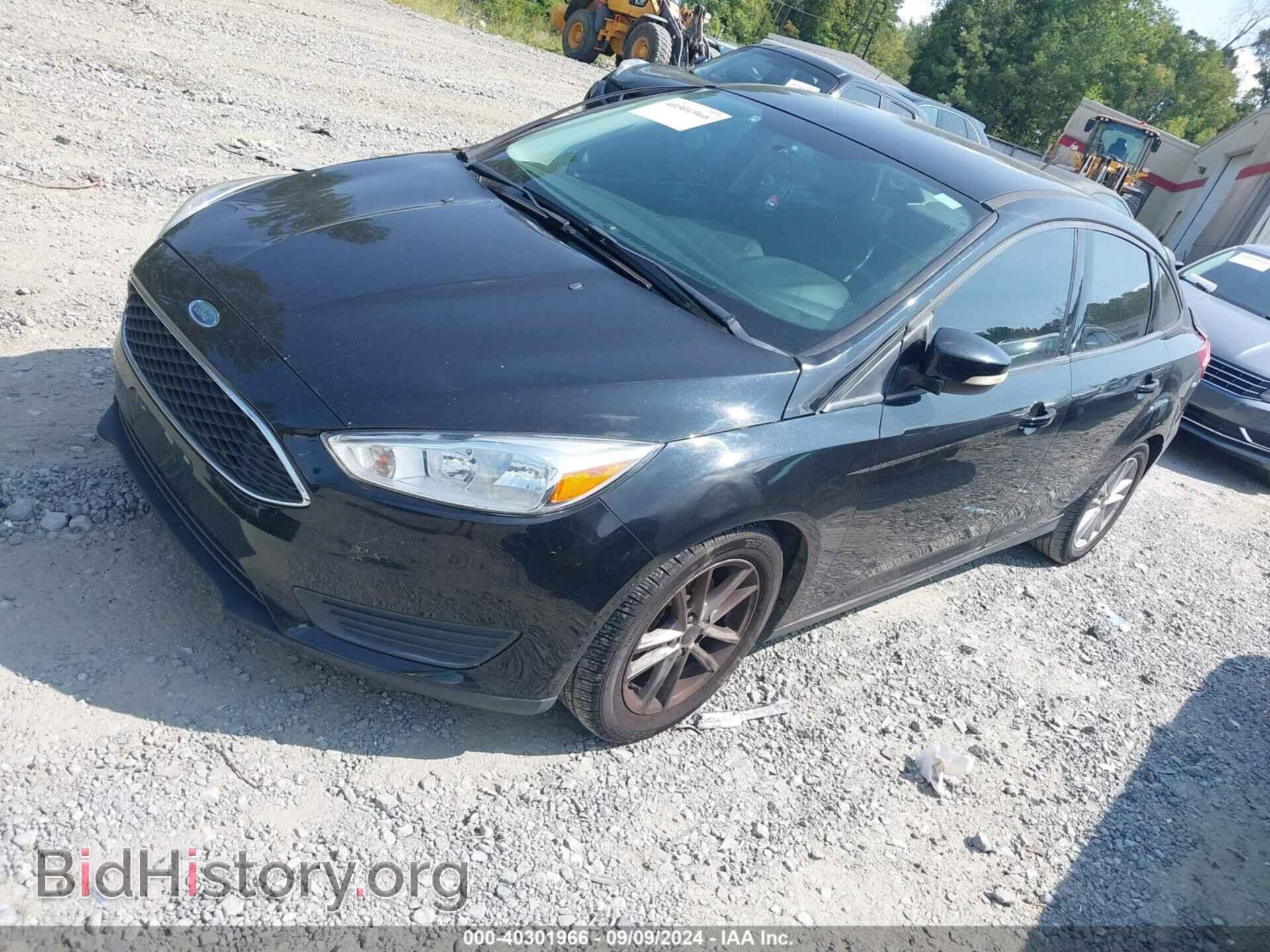 2016 FORD FOCUS - VIN: 1FADP3F29GL292396 - Фото 2