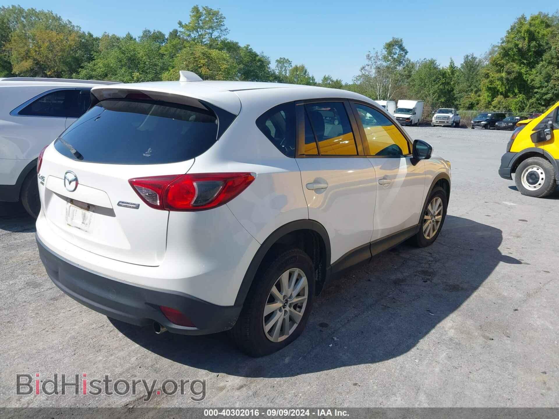 2014 MAZDA CX-5 - VIN: JM3KE4CY6E0321283 - Фото 4