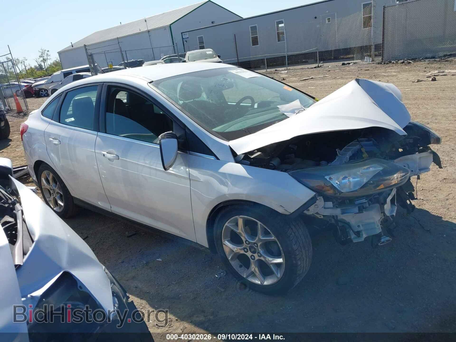 Фотография 1FADP3J21EL228695 - FORD FOCUS 2014