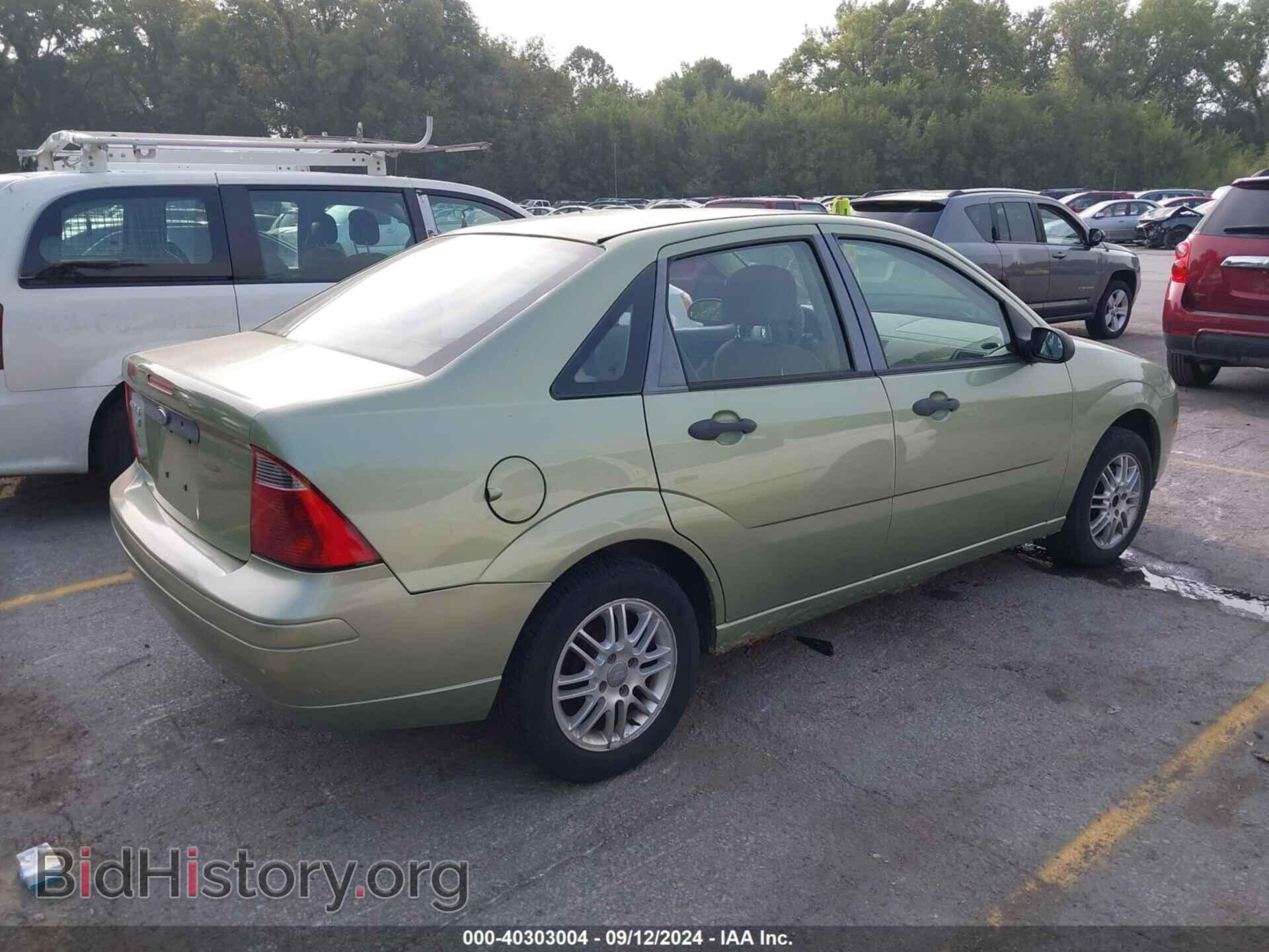 2007 FORD FOCUS - VIN: 1FAFP34N47W210739 - Фото 4