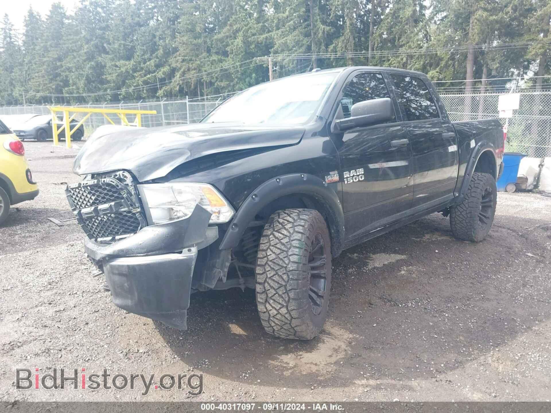 2014 RAM 1500 - VIN: 3C6RR7KT2EG226189 - Фото 2