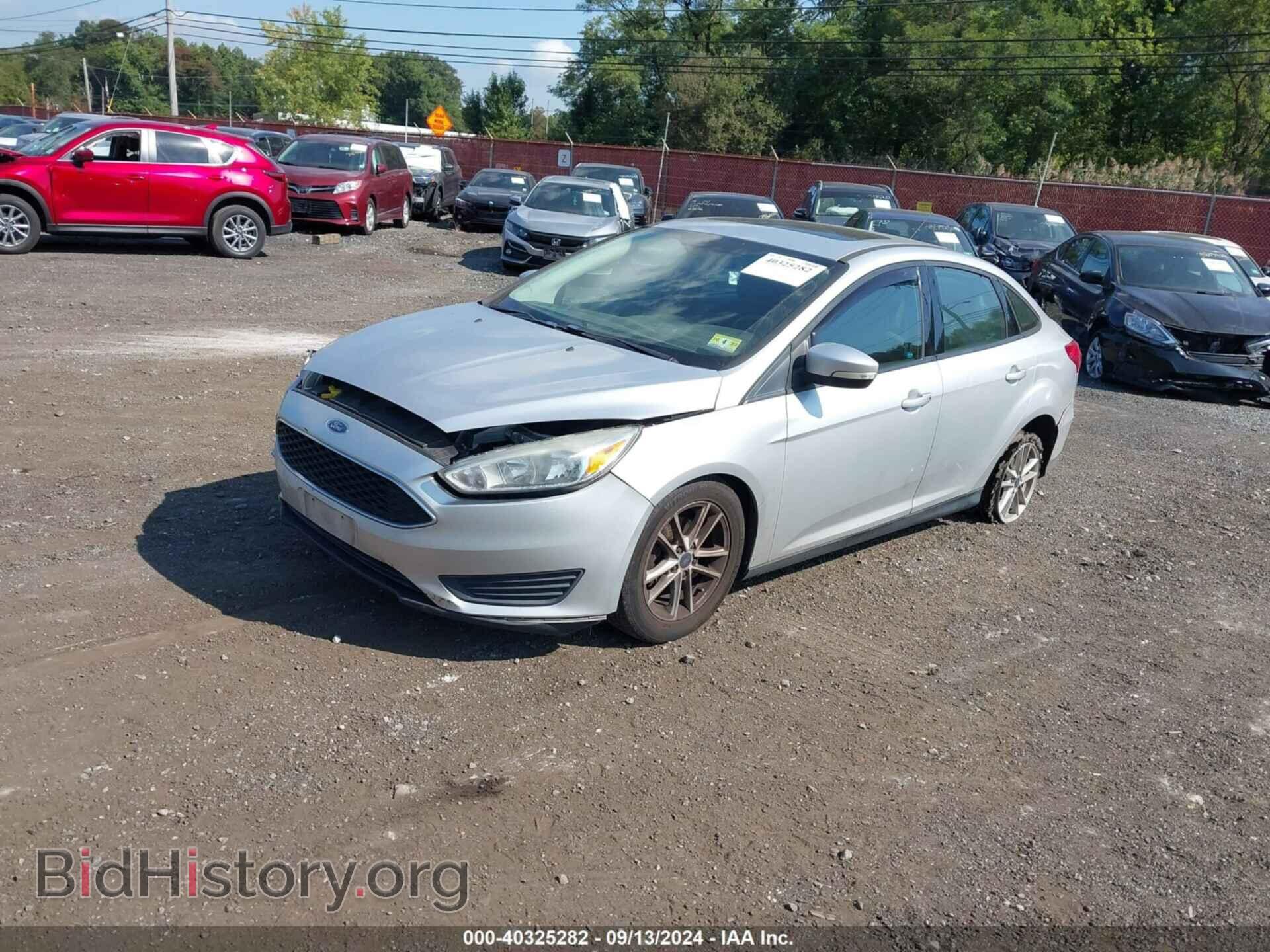 2016 FORD FOCUS - VIN: 1FADP3F28GL338784 - Фото 2