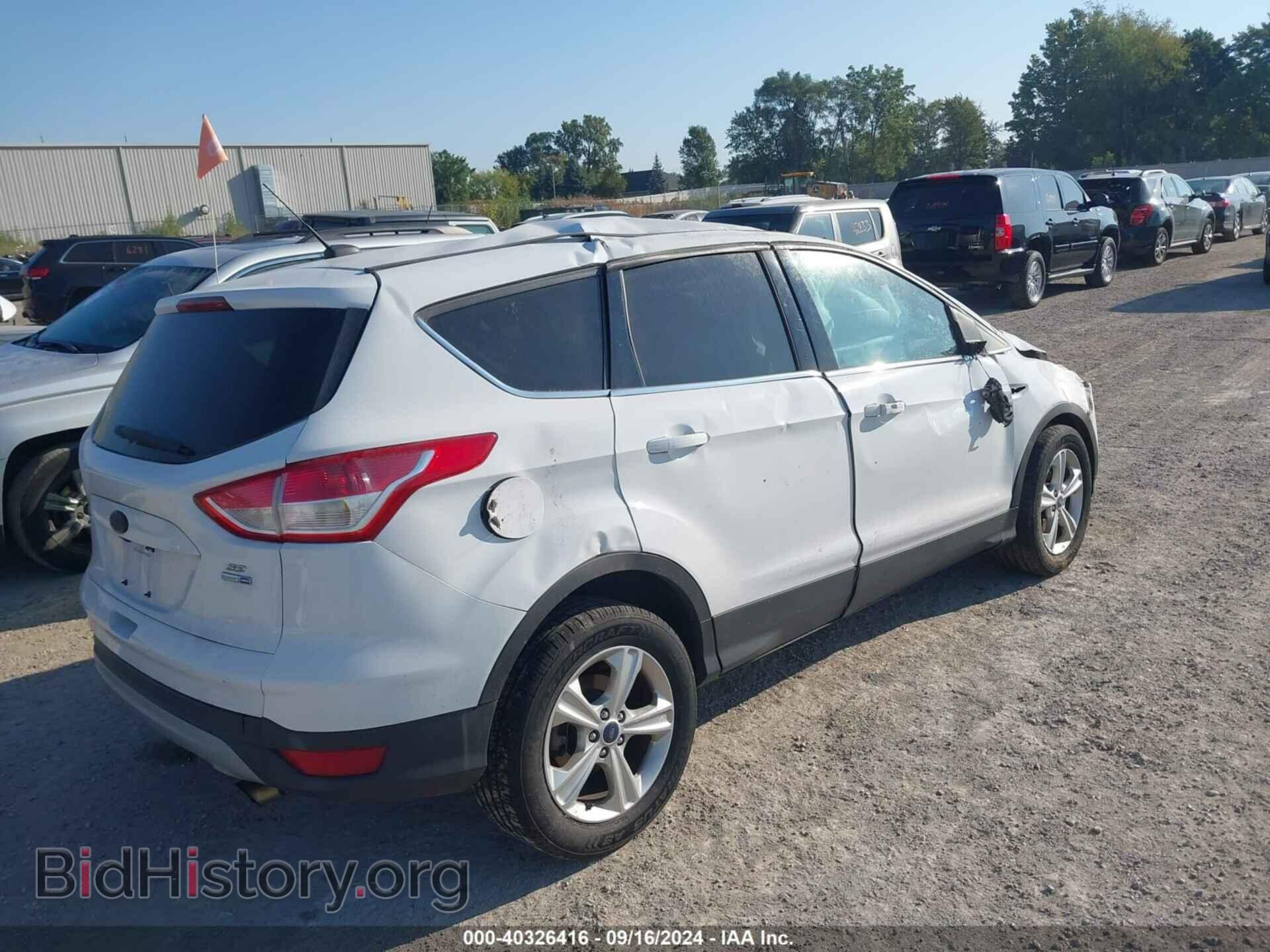 2014 FORD ESCAPE - VIN: 1FMCU9GX2EUD08954 - Photo 4