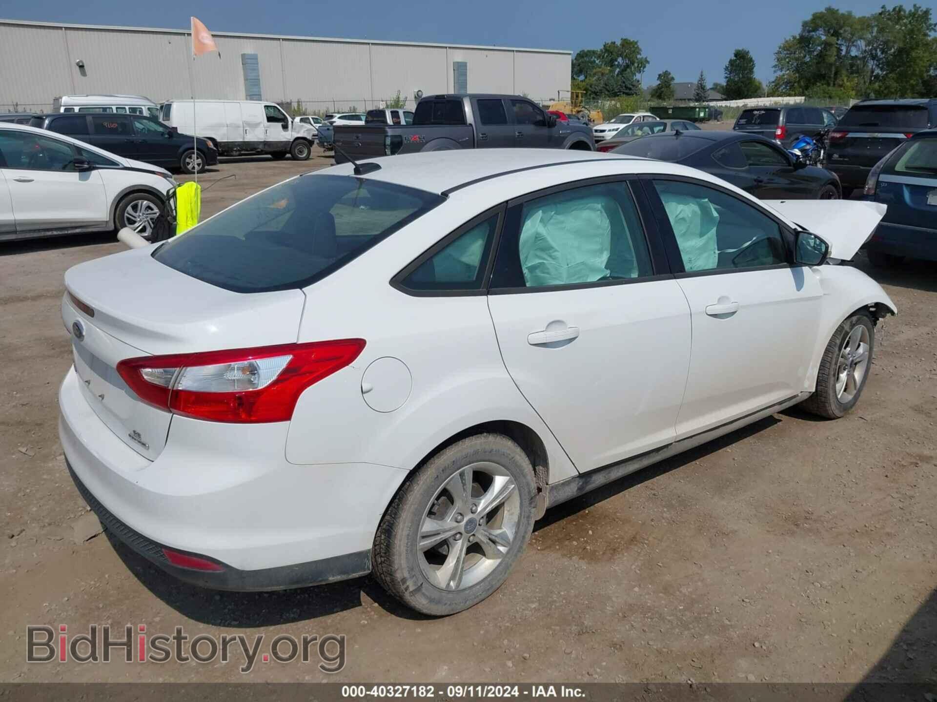 2013 FORD FOCUS - VIN: 1FADP3F29DL250953 - Photo 4