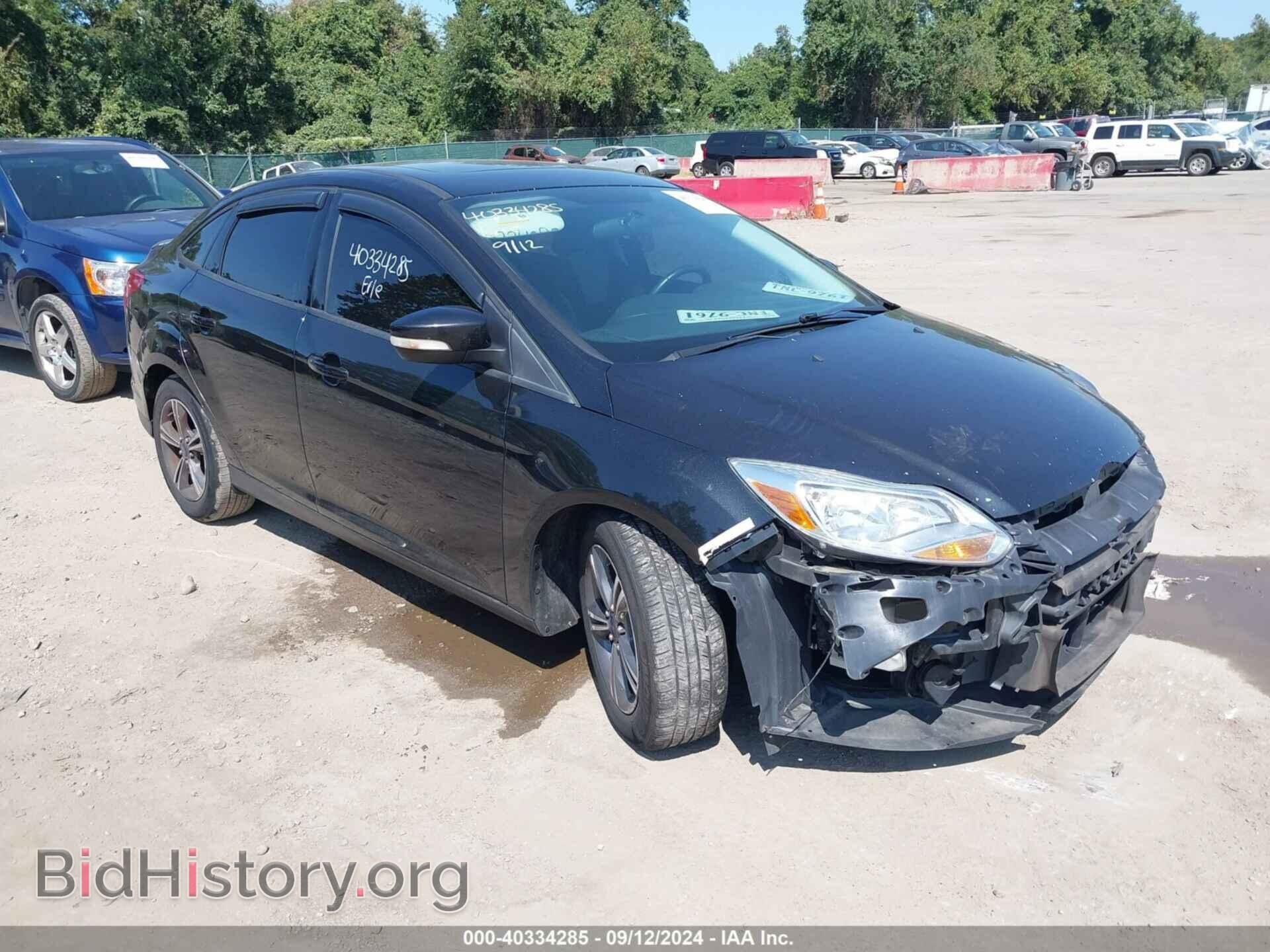 Фотография 1FADP3F26EL418419 - FORD FOCUS 2014