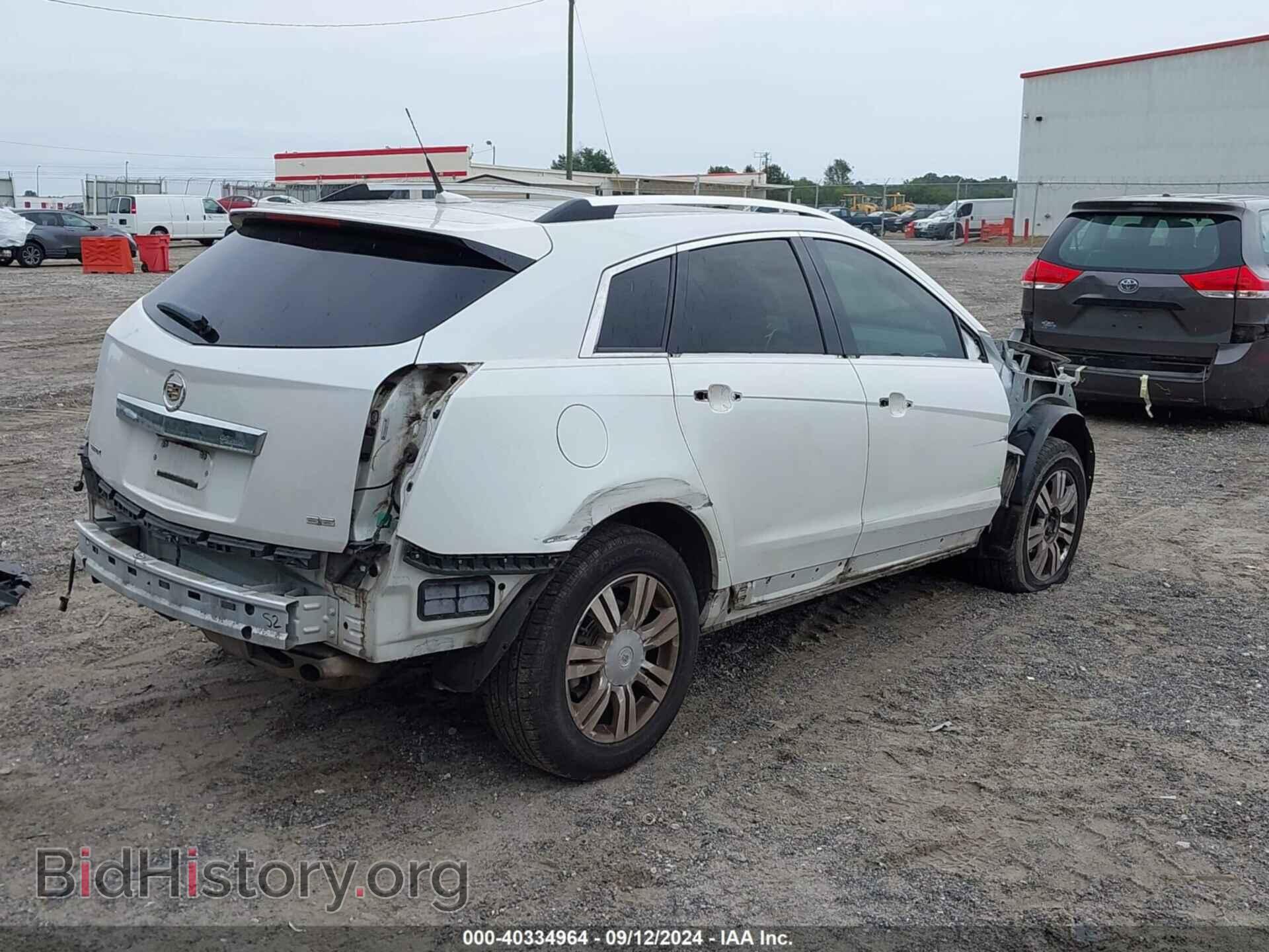 2013 CADILLAC SRX - VIN: 3GYFNCE30DS573716 - Фото 4