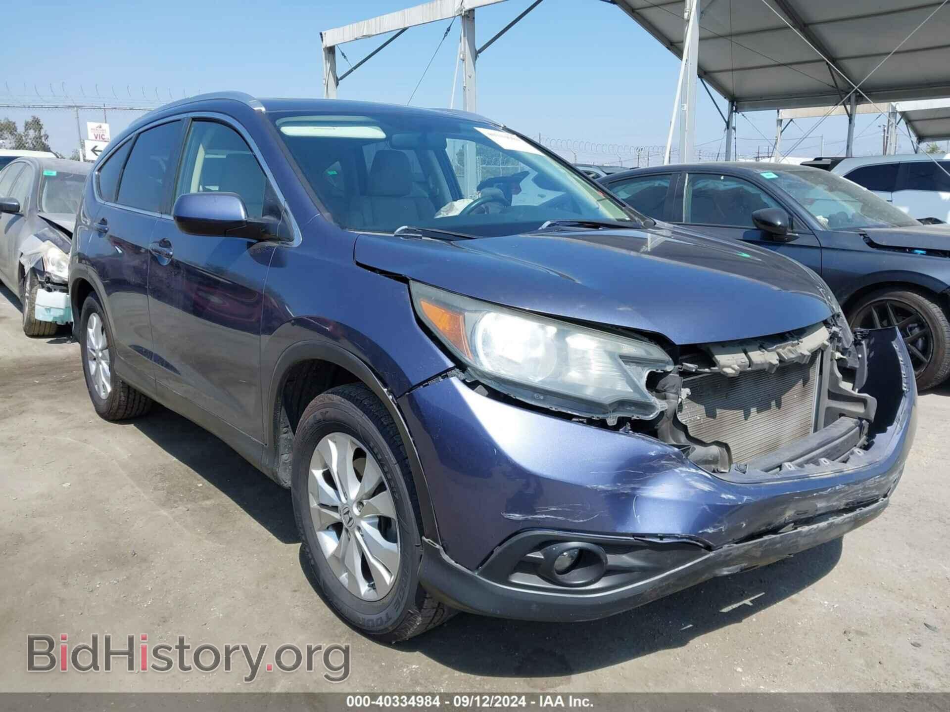 Фотография JHLRM3H79CC010076 - HONDA CR-V 2012