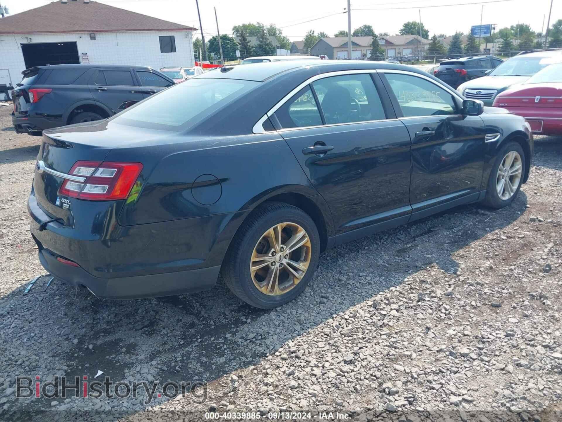 2014 FORD TAURUS - VIN: 1FAHP2H85EG103990 - Photo 4