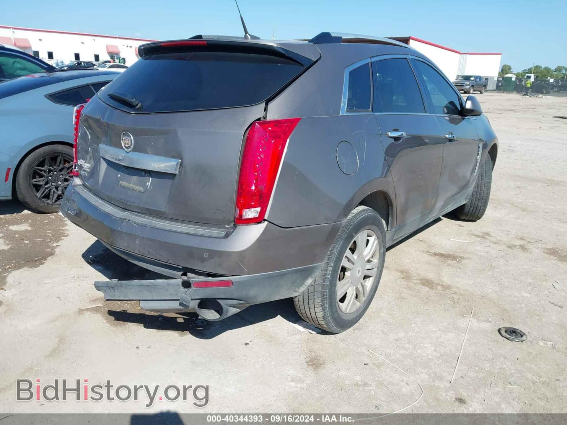 2011 CADILLAC SRX - VIN: 3GYFNAEY3BS569074 - Фото 4