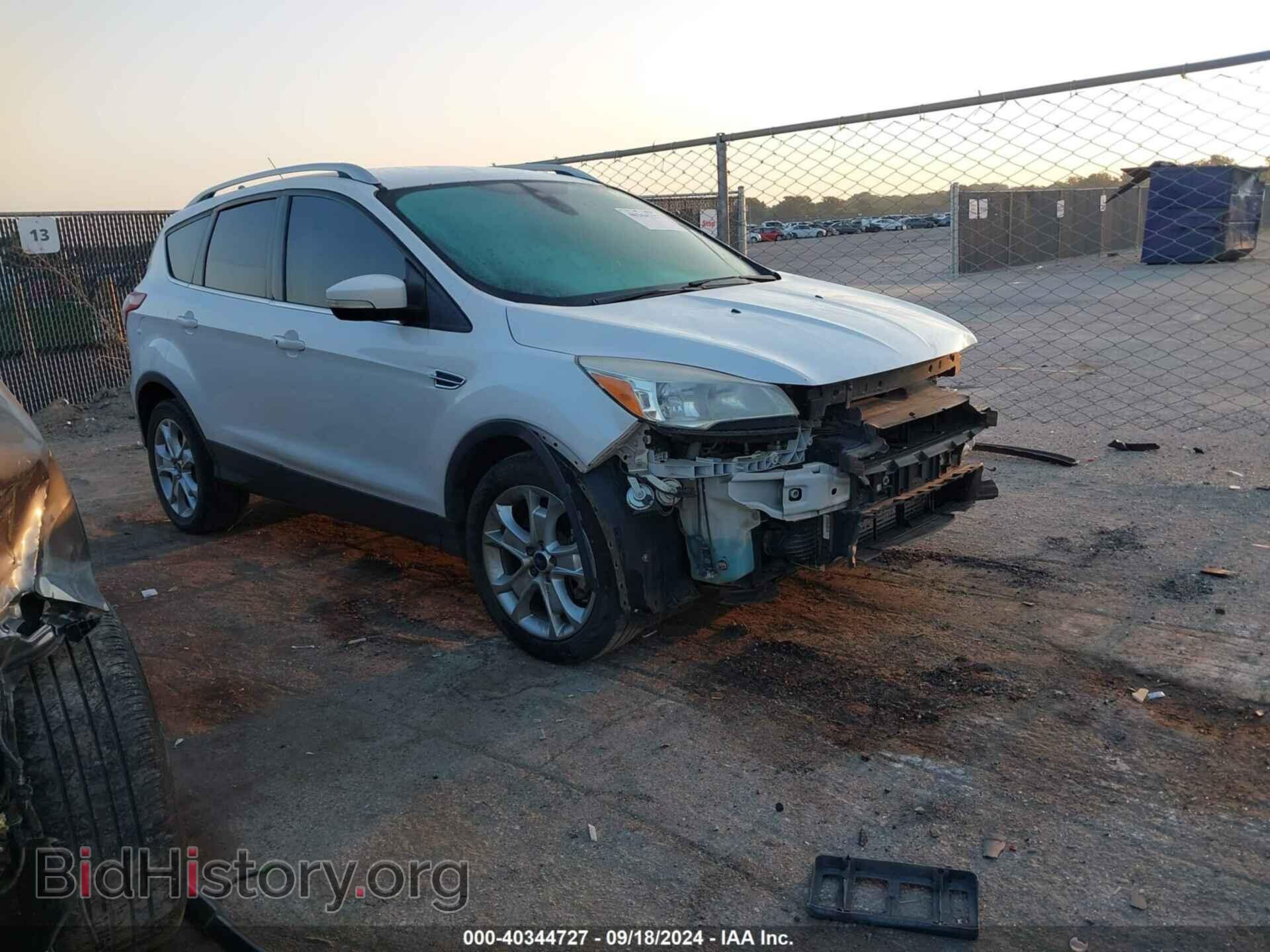 Фотография 1FMCU0J98GUA10000 - FORD ESCAPE 2016