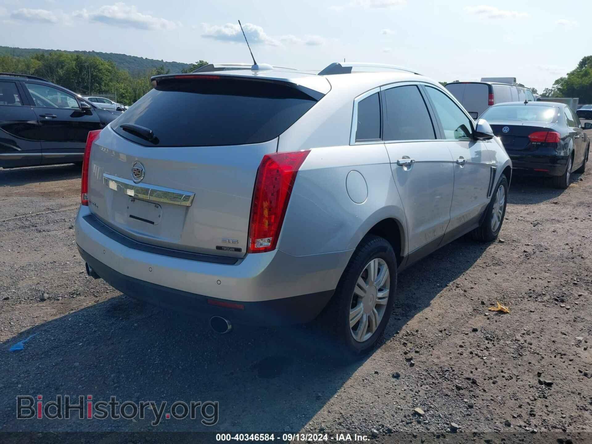 2016 CADILLAC SRX - VIN: 3GYFNEE38GS569056 - Фото 4
