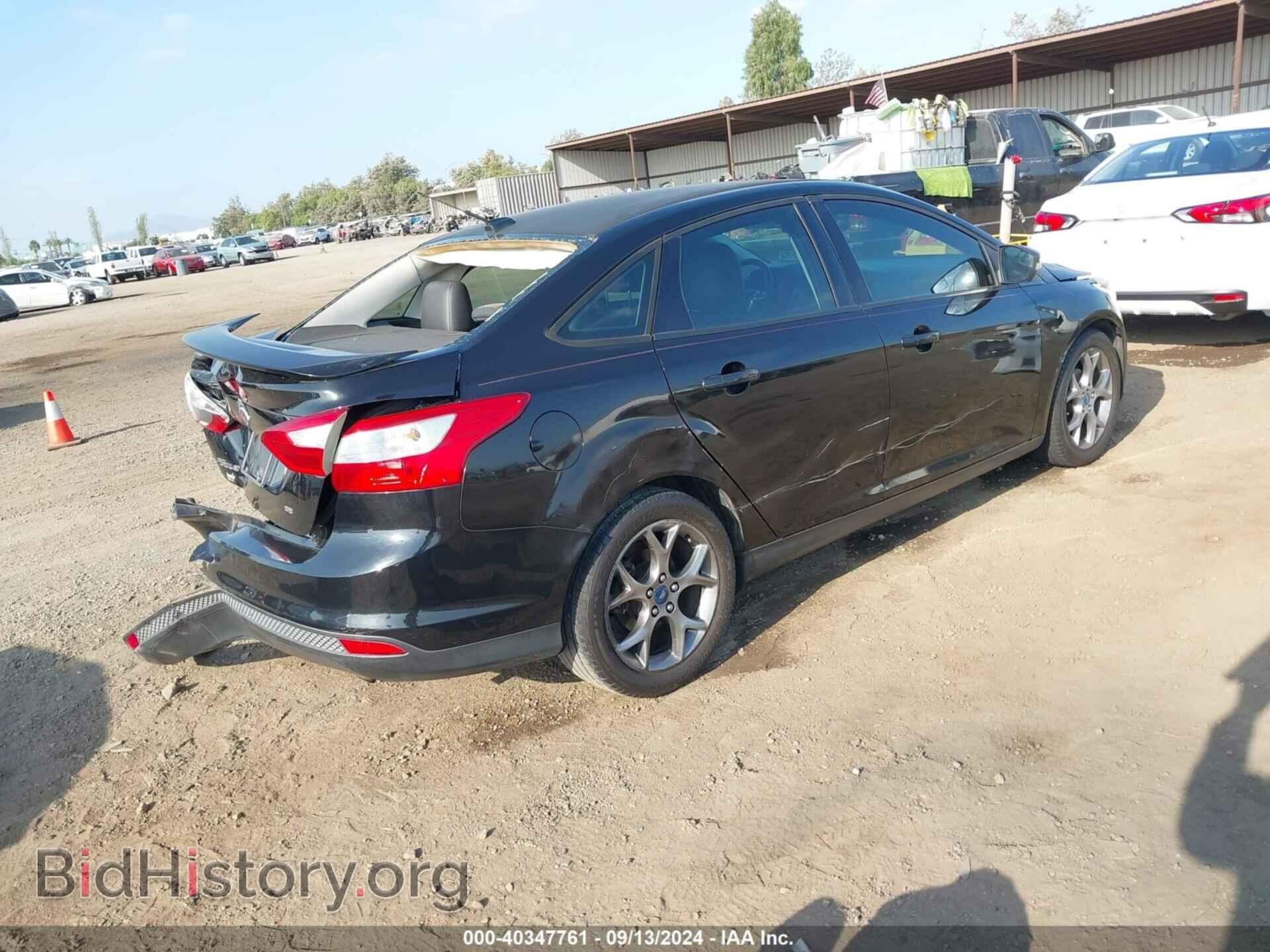 2013 FORD FOCUS - VIN: 1FADP3F23DL135703 - Photo 4