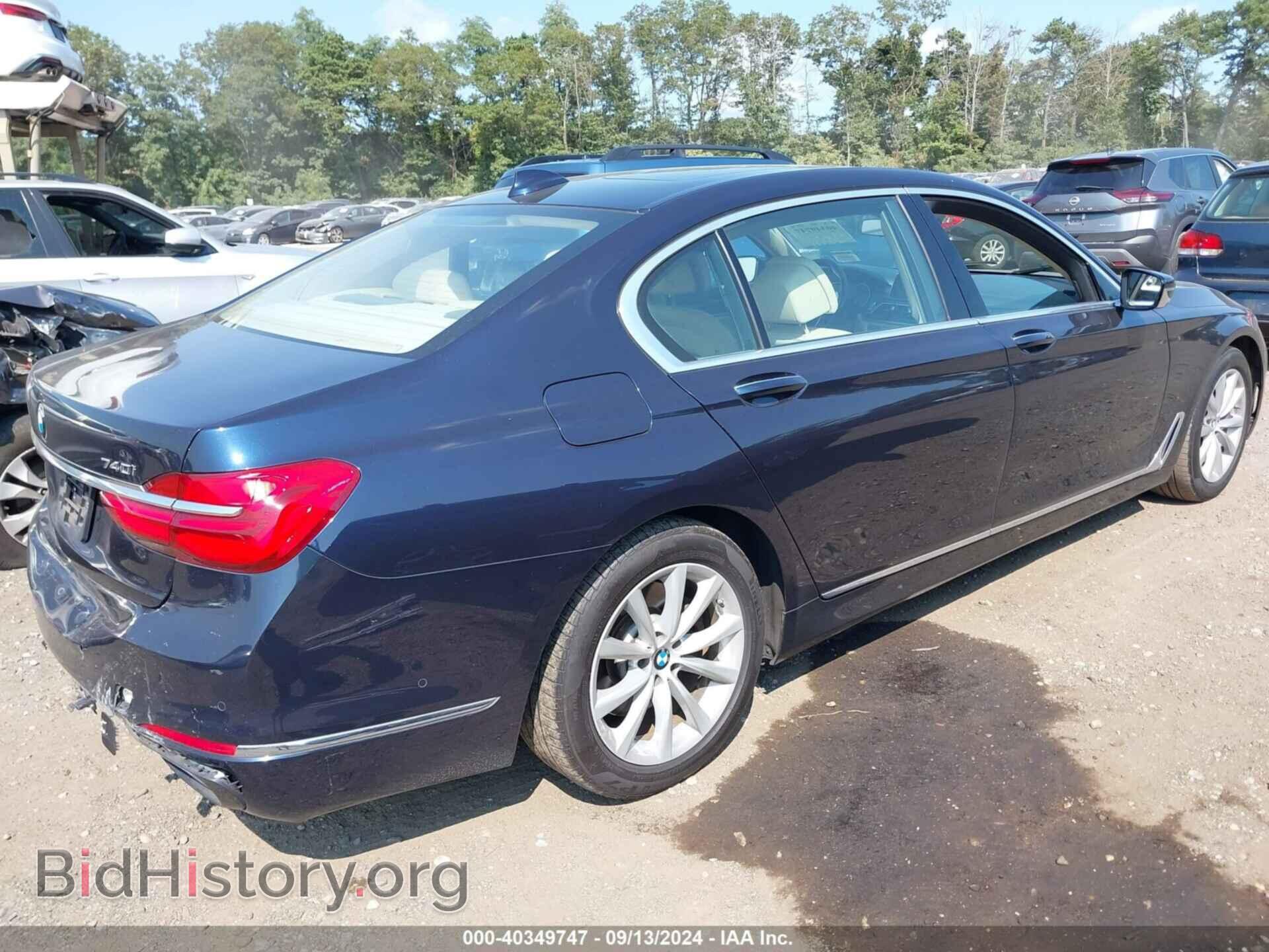 2016 BMW 740I - VIN: WBA7E2C50GG548369 - Фото 4