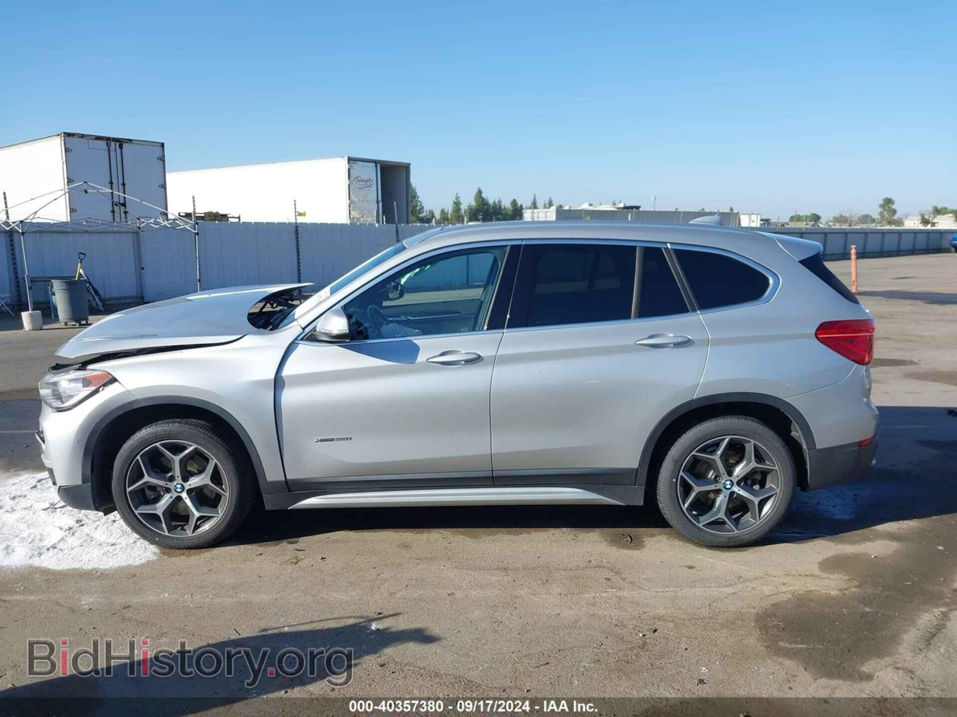 2017 BMW X1 - VIN: WBXHT3C38H5F72231 - Фото 14