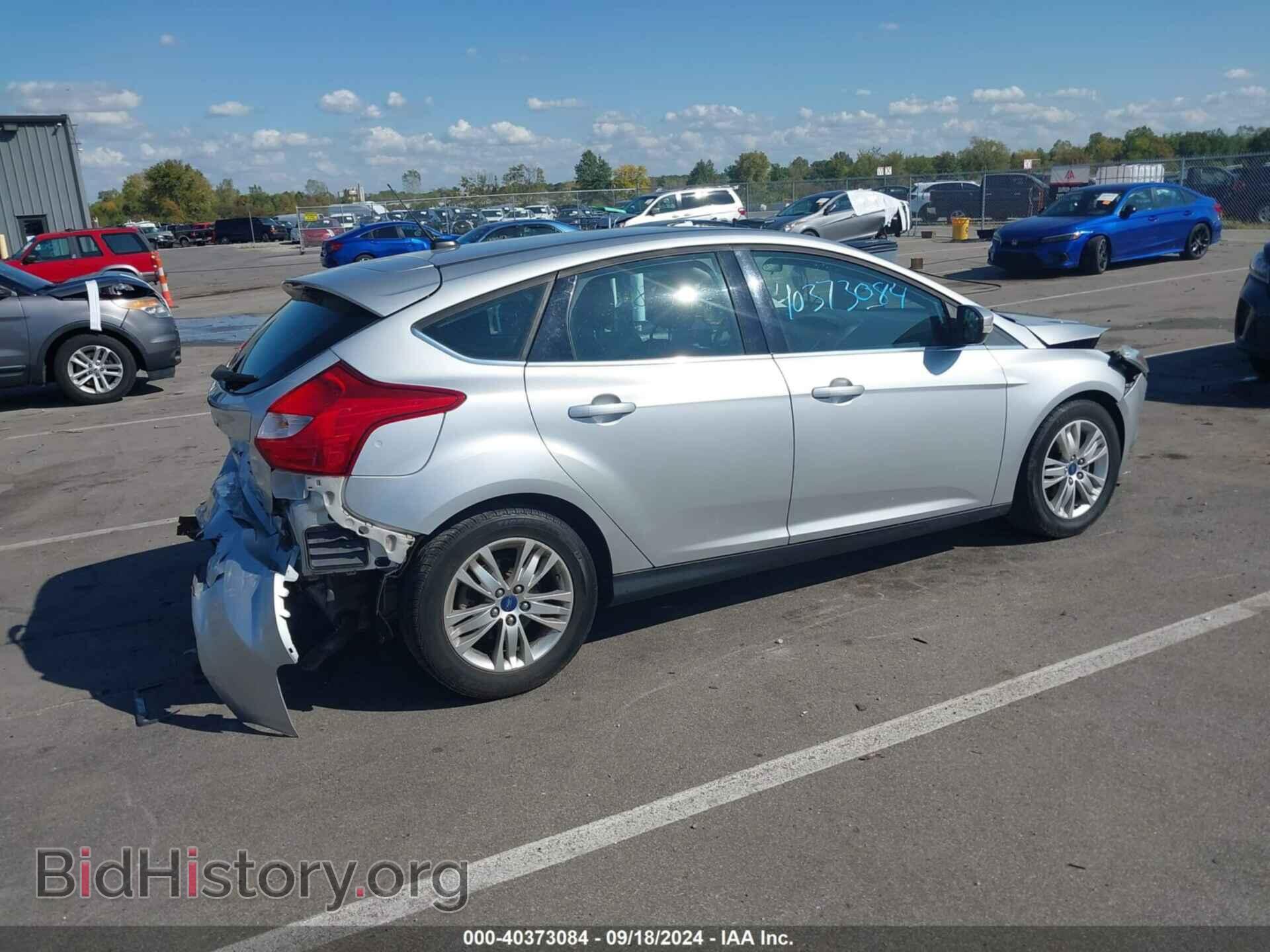 2012 FORD FOCUS - VIN: 1FAHP3M2XCL219021 - Photo 4