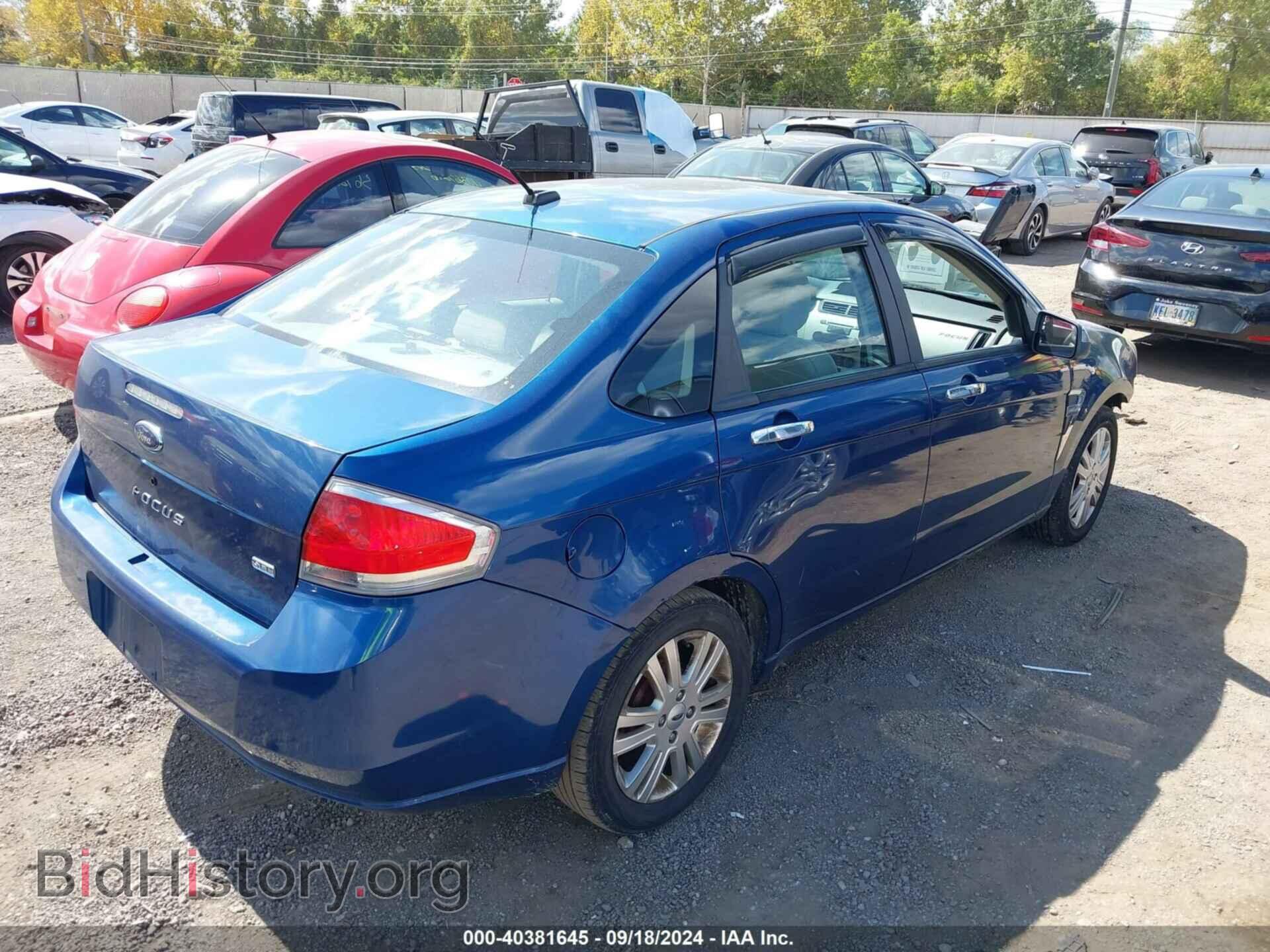 2009 FORD FOCUS - VIN: 1FAHP37N29W252253 - Фото 4