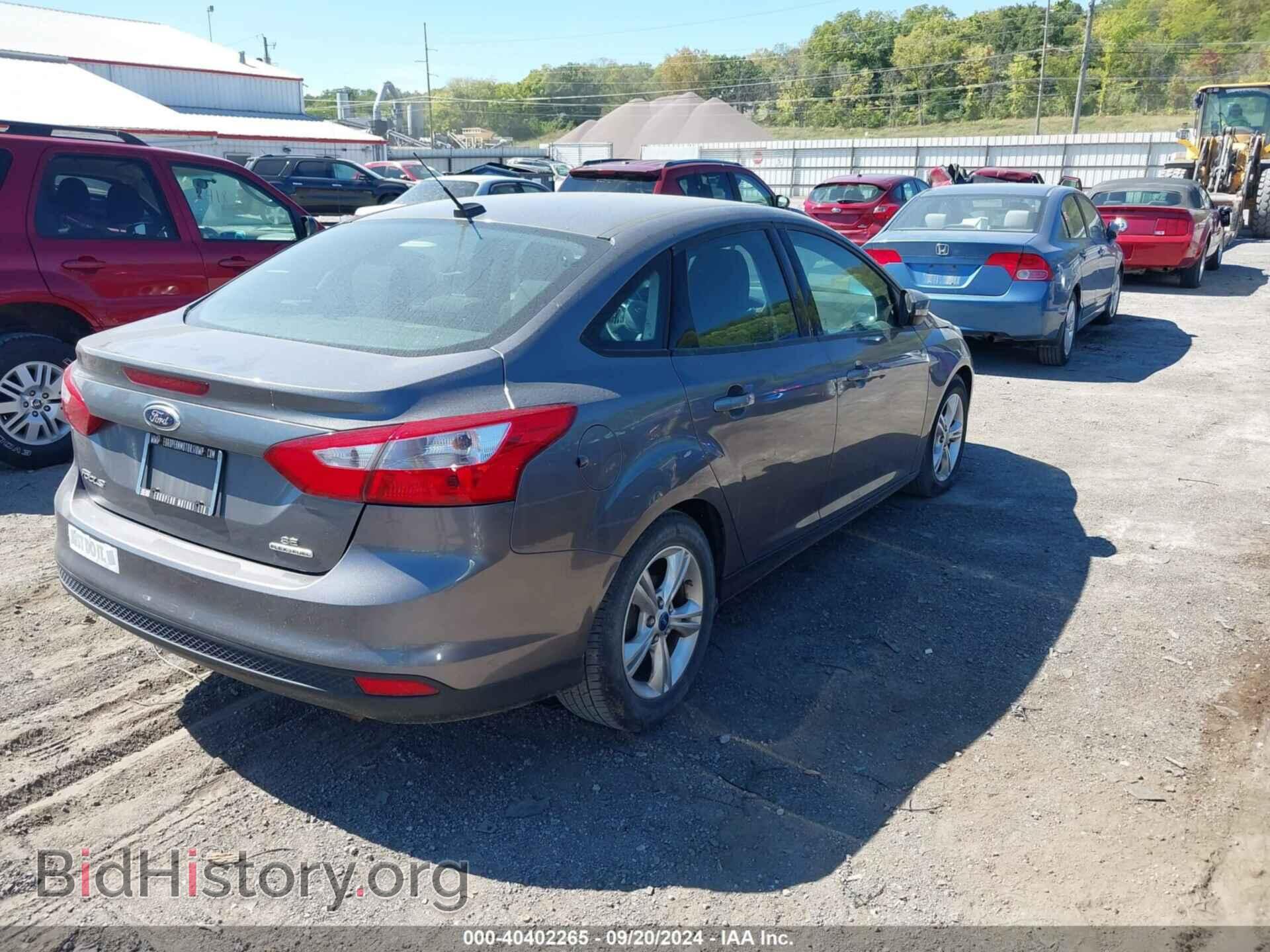 2013 FORD FOCUS - VIN: 1FADP3F23DL199420 - Photo 4