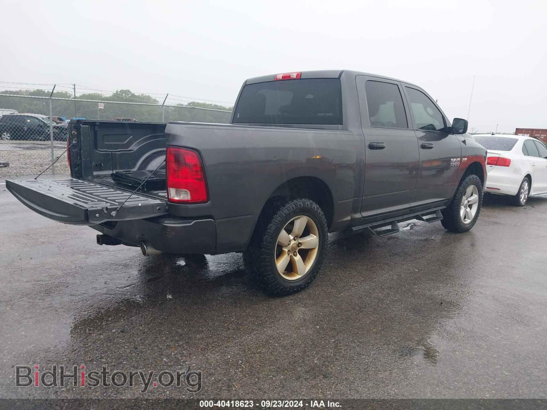2014 RAM 1500 - VIN: 3C6RR7KT4EG285289 - Фото 4