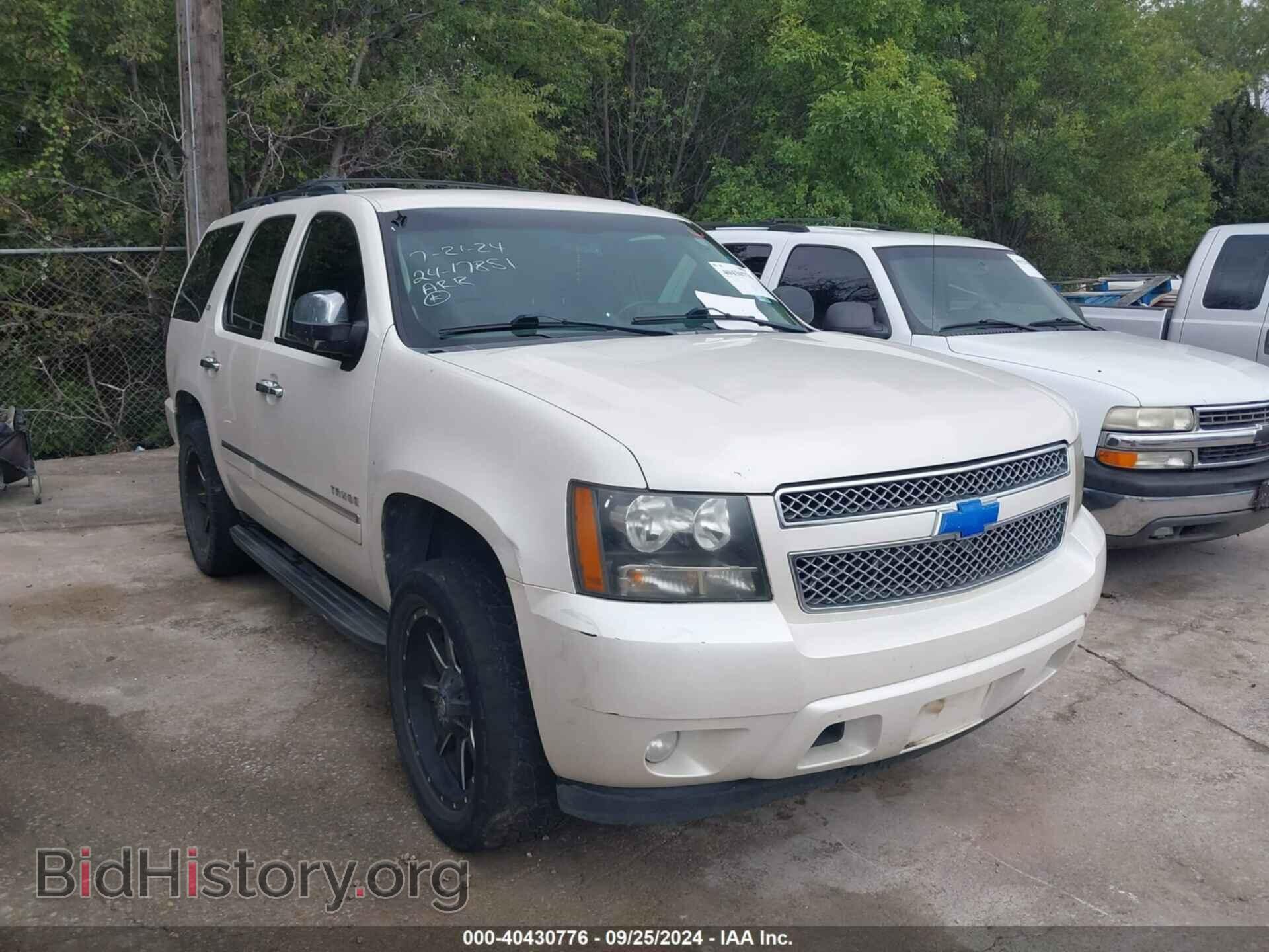 Фотография 1GNSCCE06BR197840 - CHEVROLET TAHOE 2011