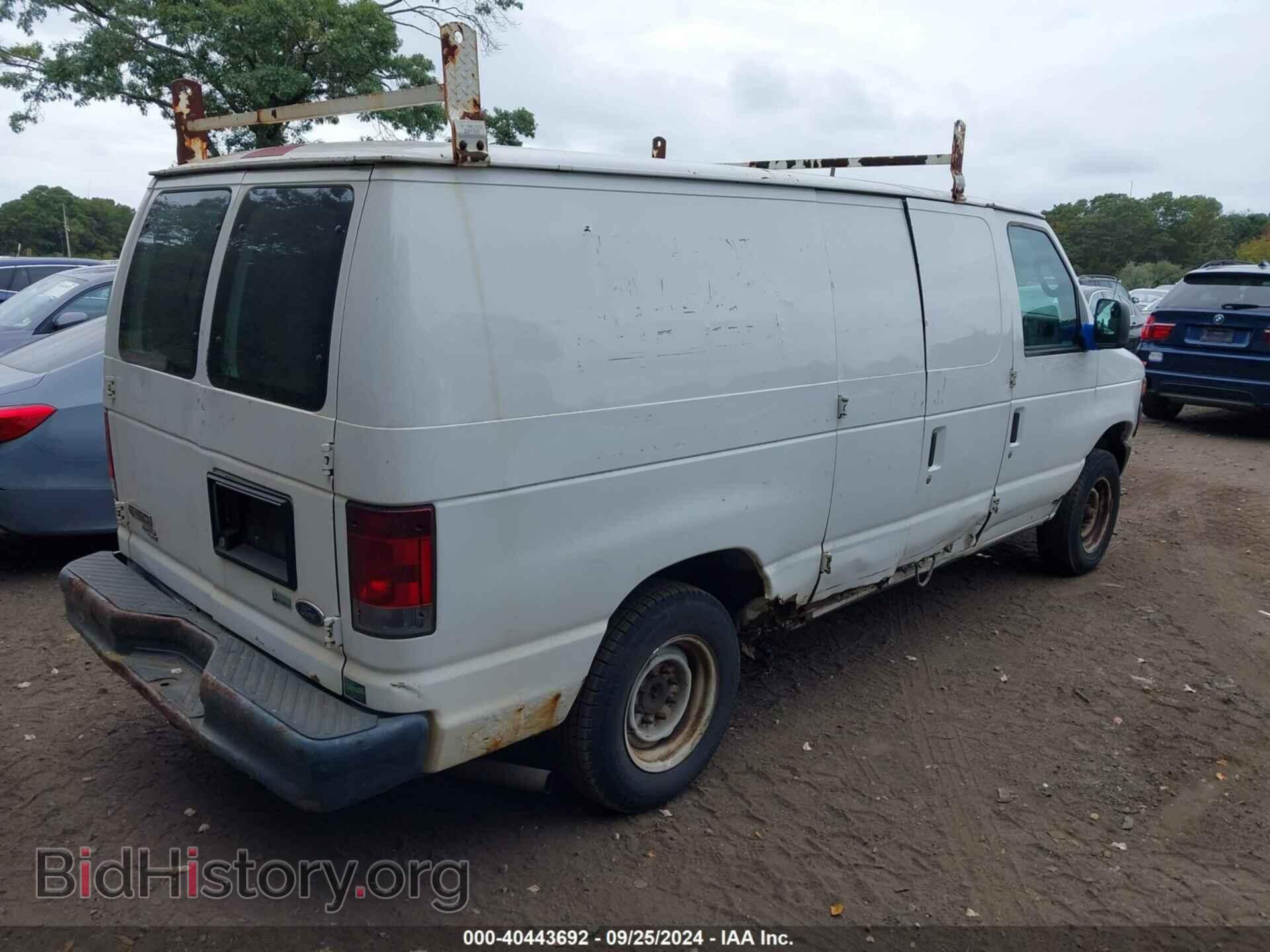 2011 FORD E-150 - VIN: 1FTNE1EW0BDB18779 - Фото 4