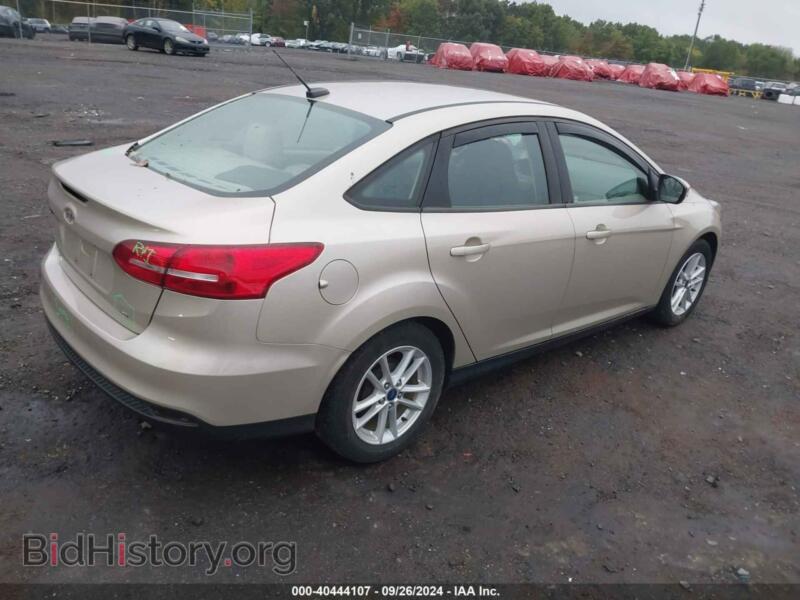 2017 Ford FOCUS (VIN 1FADP3F25HL335617) — photo 4 of 16