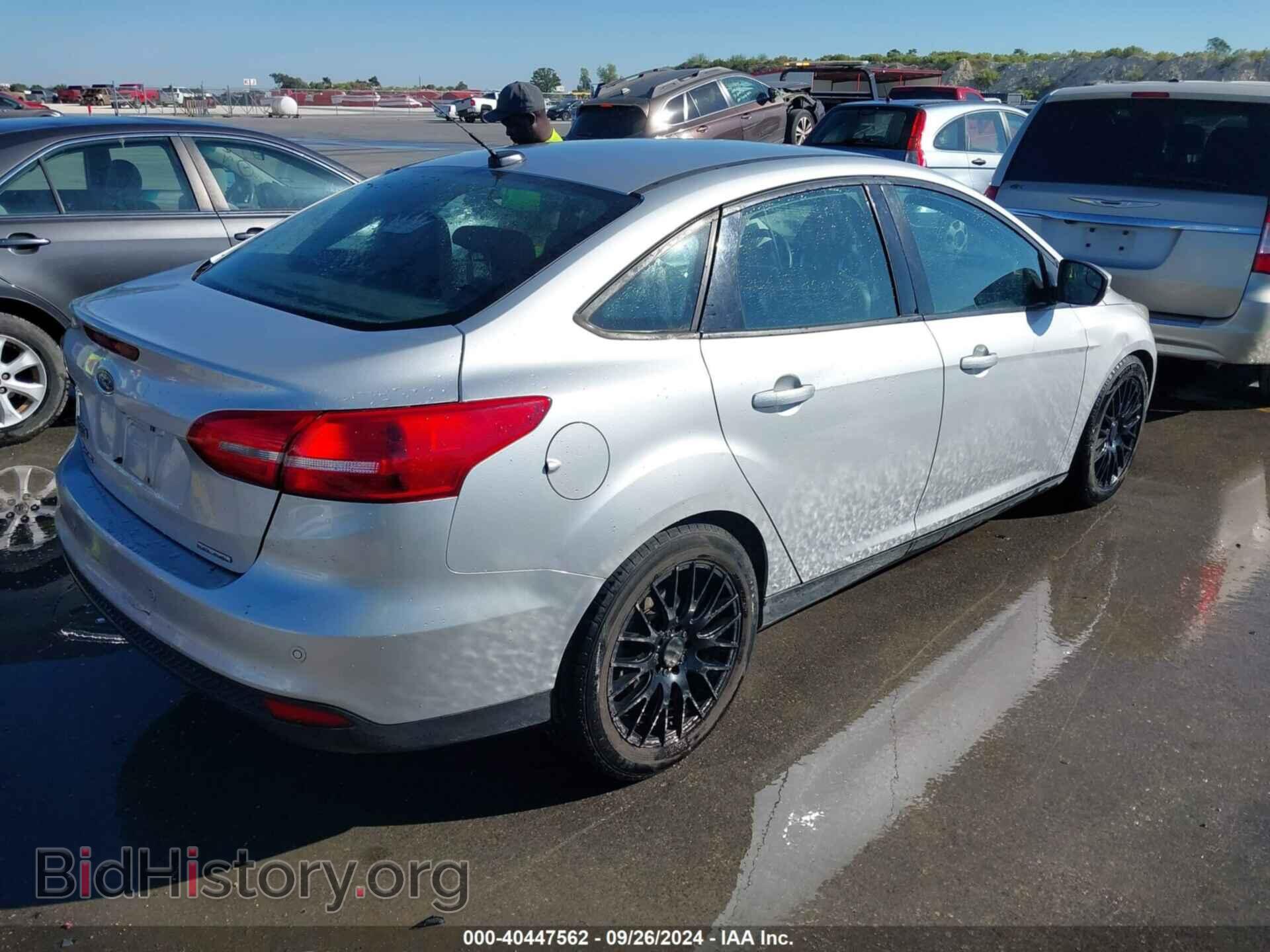 2016 FORD FOCUS - VIN: 1FADP3F24GL290720 - Фото 4