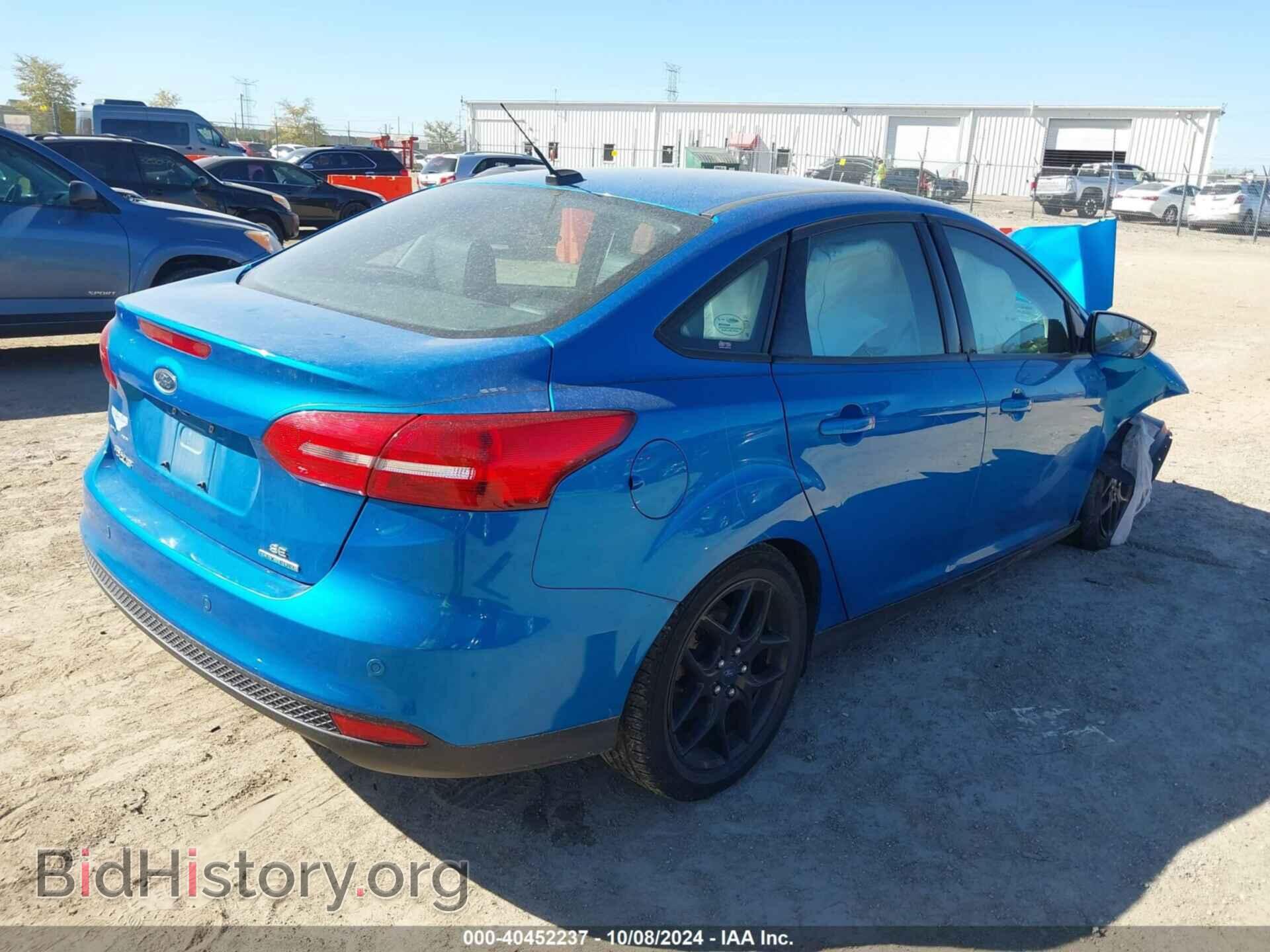 2016 FORD FOCUS - VIN: 1FADP3F21GL250966 - Photo 4