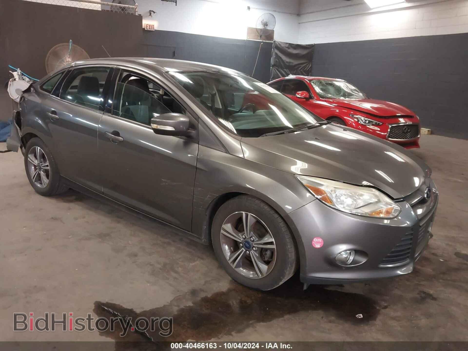 Фотография 1FADP3F28EL424710 - FORD FOCUS 2014