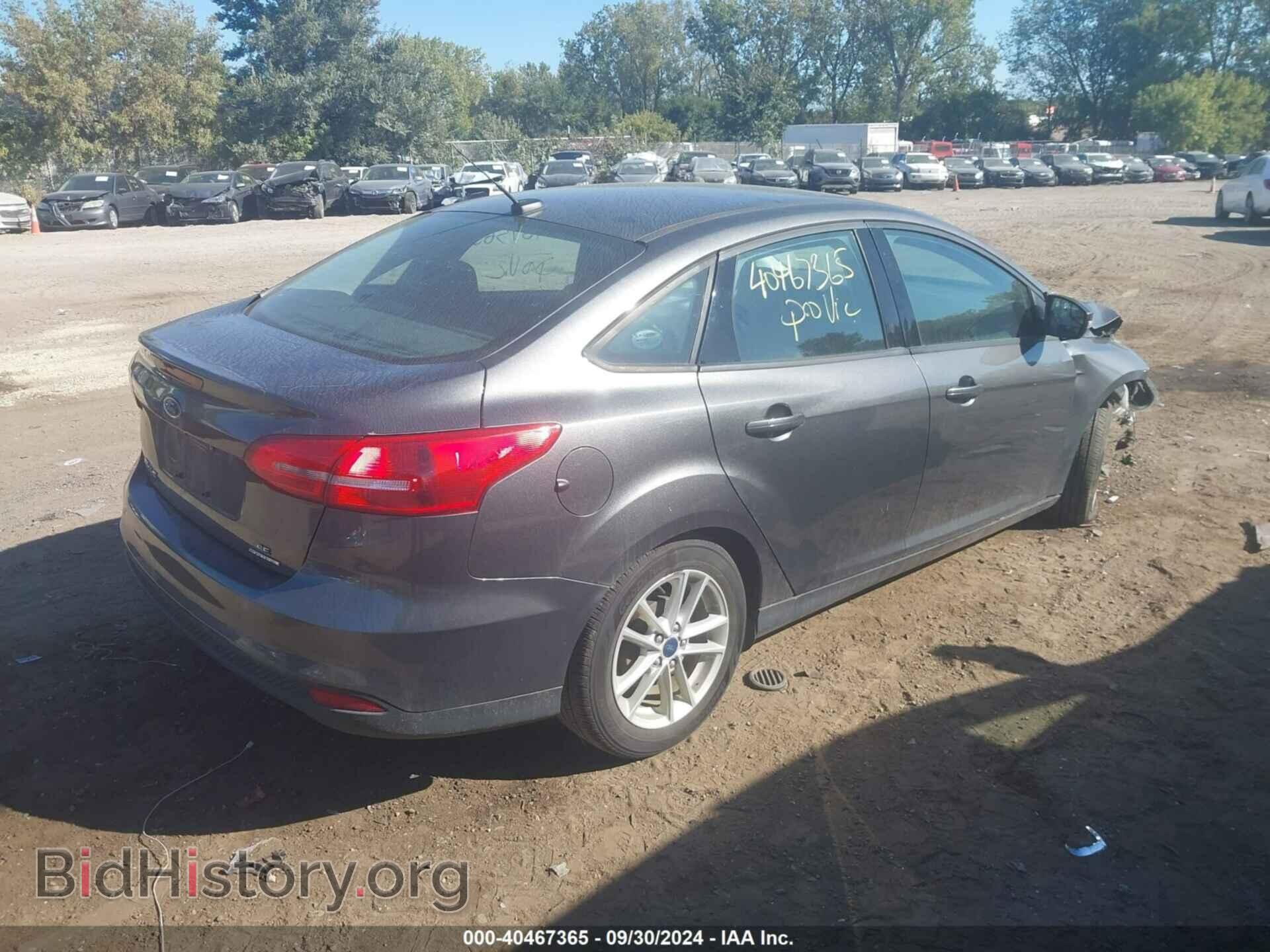2015 FORD FOCUS - VIN: 1FADP3F21FL383421 - Photo 4