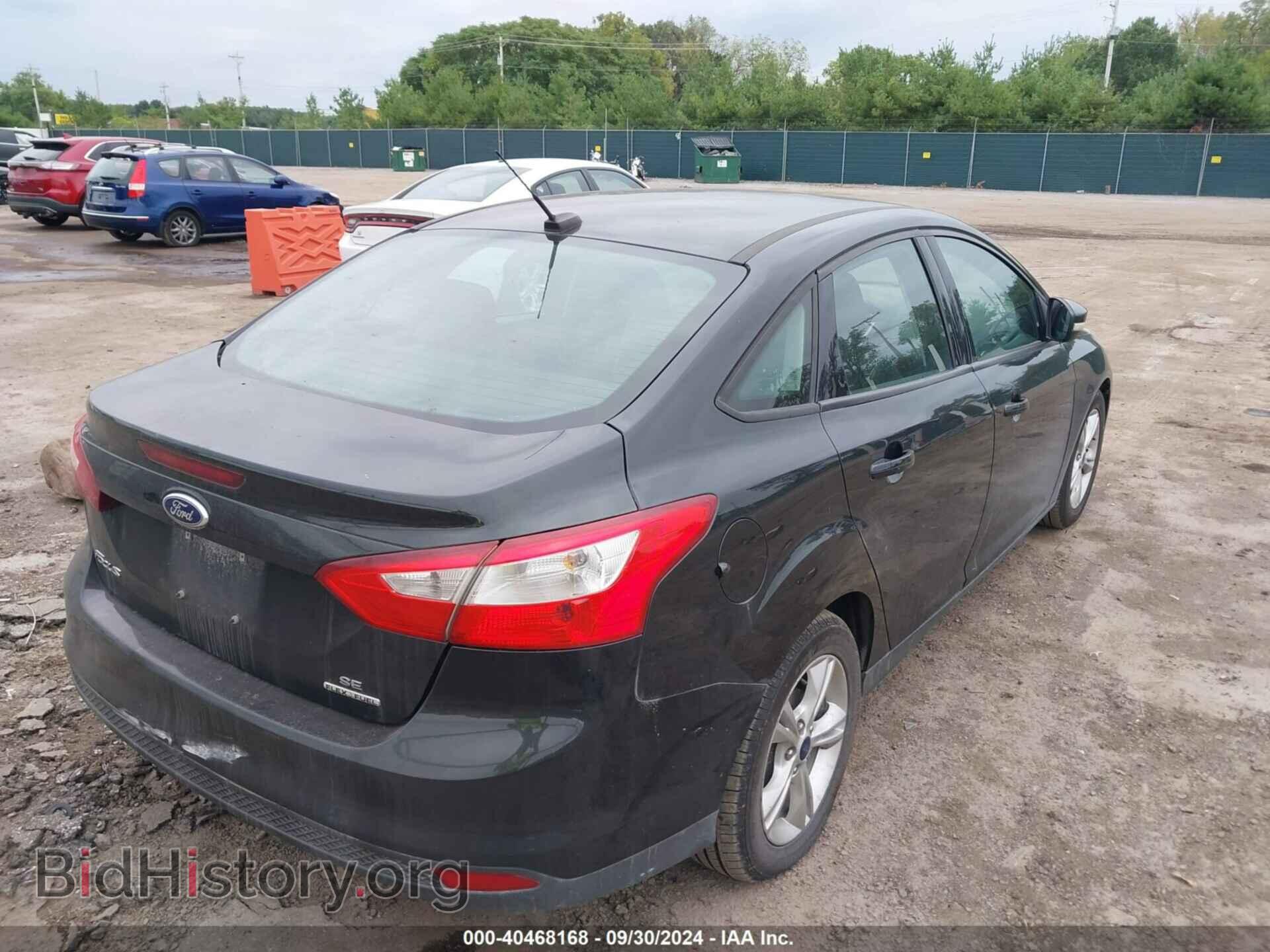 2014 FORD FOCUS - VIN: 1FADP3F20EL448922 - Photo 4