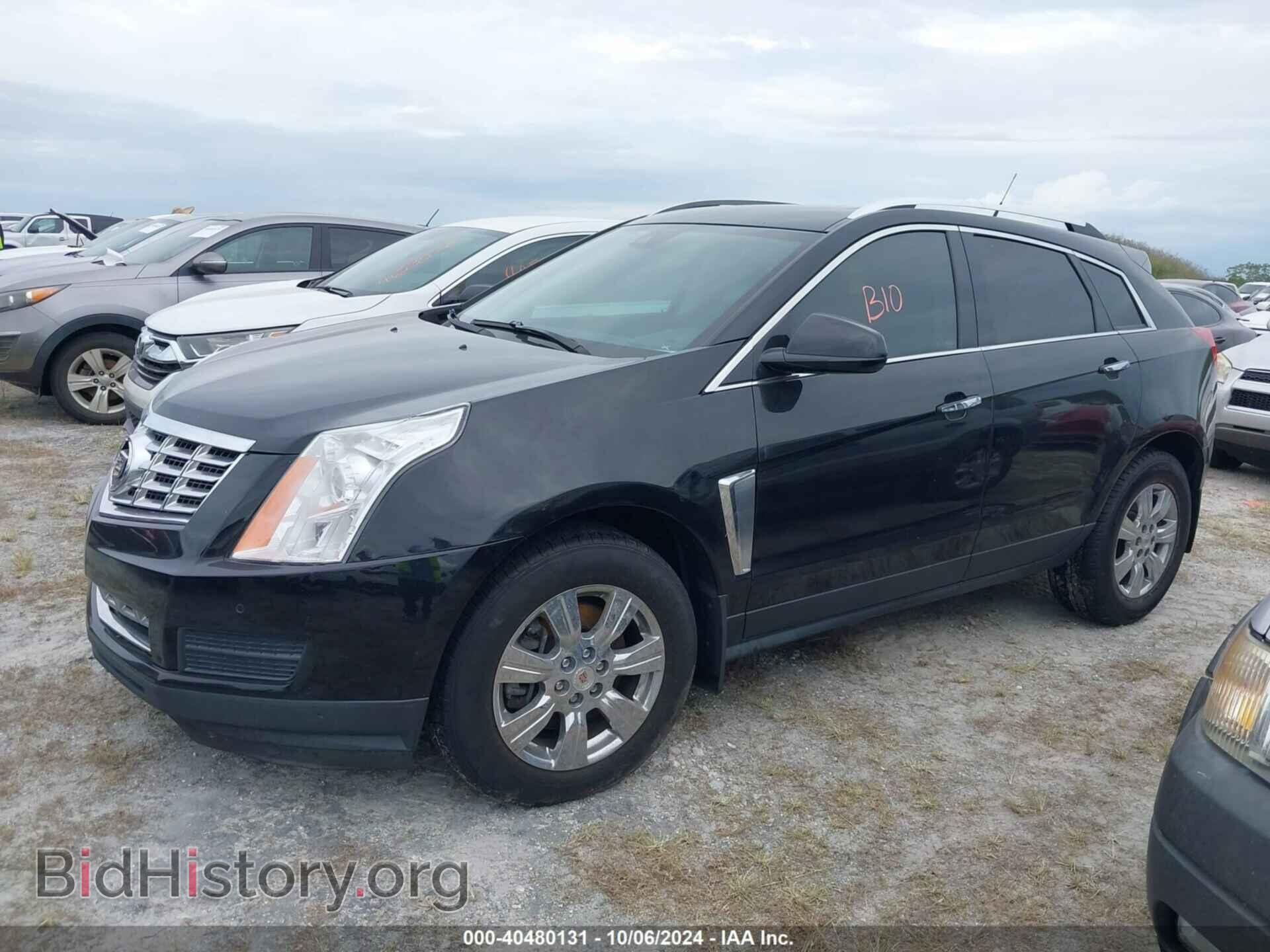 2014 CADILLAC SRX - VIN: 3GYFNBE35ES518514 - Фото 2