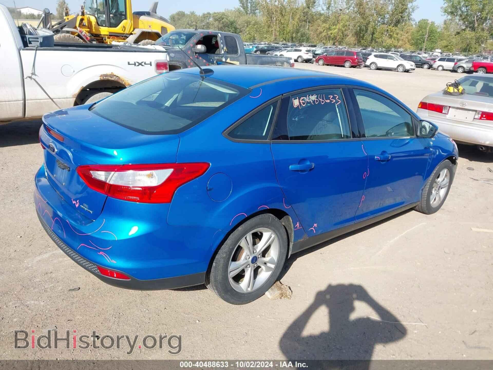 2014 FORD FOCUS - VIN: 1FADP3F21EL299971 - Photo 4
