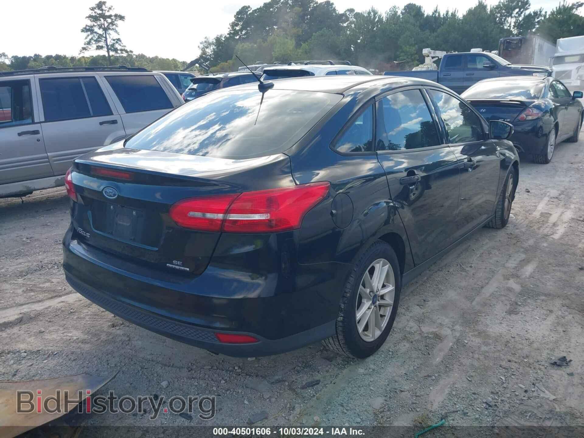 2016 FORD FOCUS - VIN: 1FADP3F20GL403837 - Photo 4