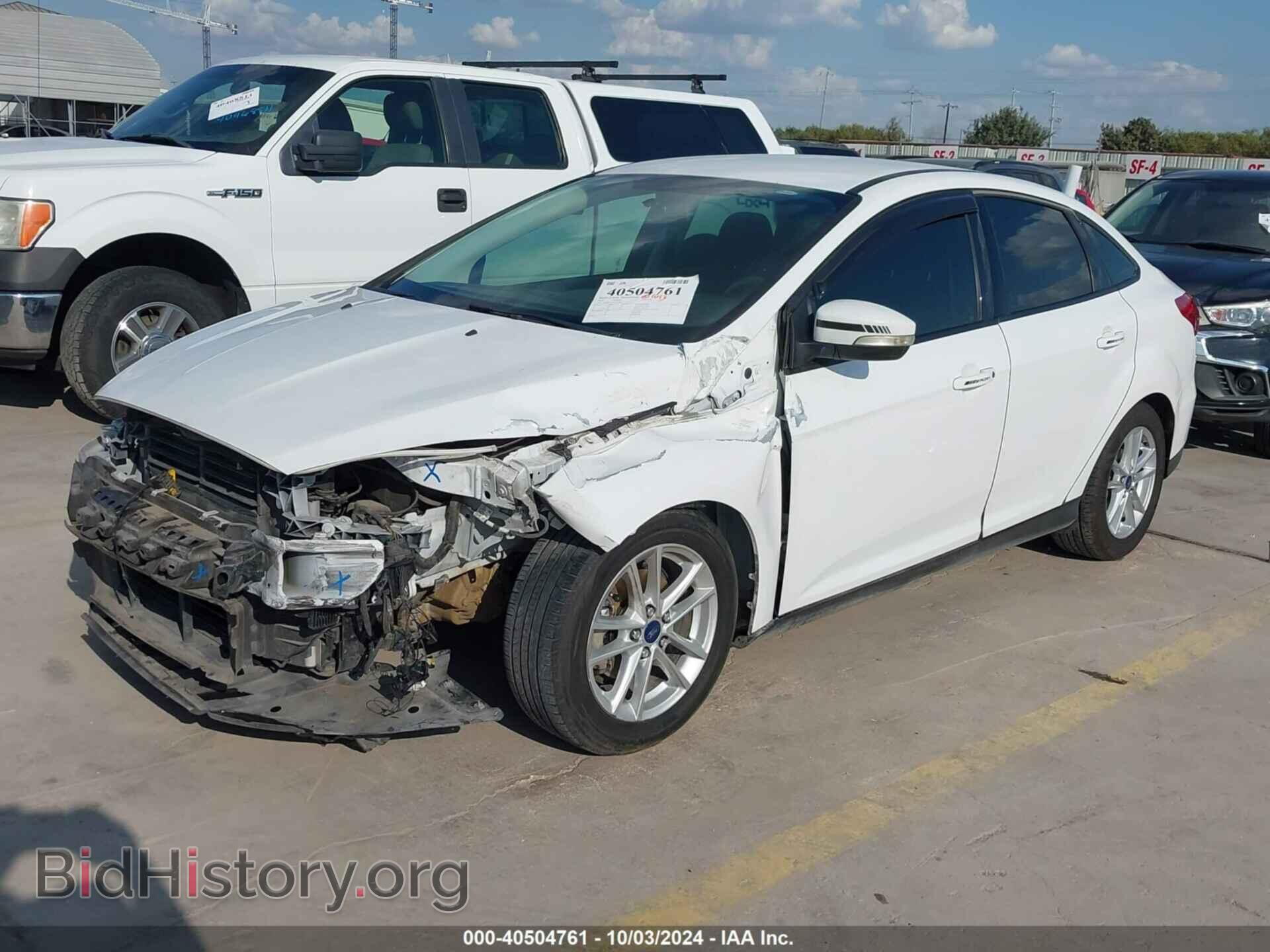 2016 FORD FOCUS - VIN: 1FADP3F21GL391245 - Фото 2