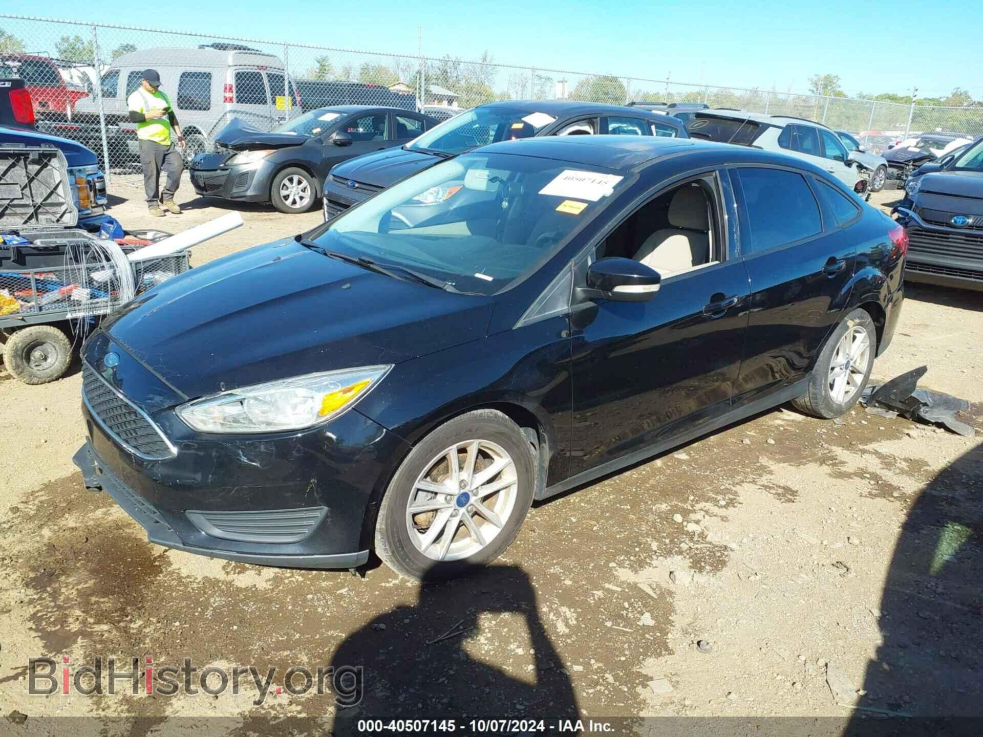 2016 FORD FOCUS - VIN: 1FADP3F22GL401491 - Фото 2
