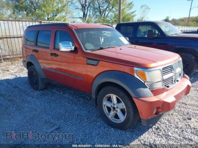 2007 Dodge NITRO SXT, orange — VIN 1D8GU28K47W569592, IAAI