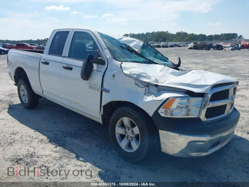 2018 RAM 1500 Tradesman 4X4 6'4 Box (VIN 1C6RR7FT6JS303224) — фото 1 из 16, IAAI, повреждение: ураган
