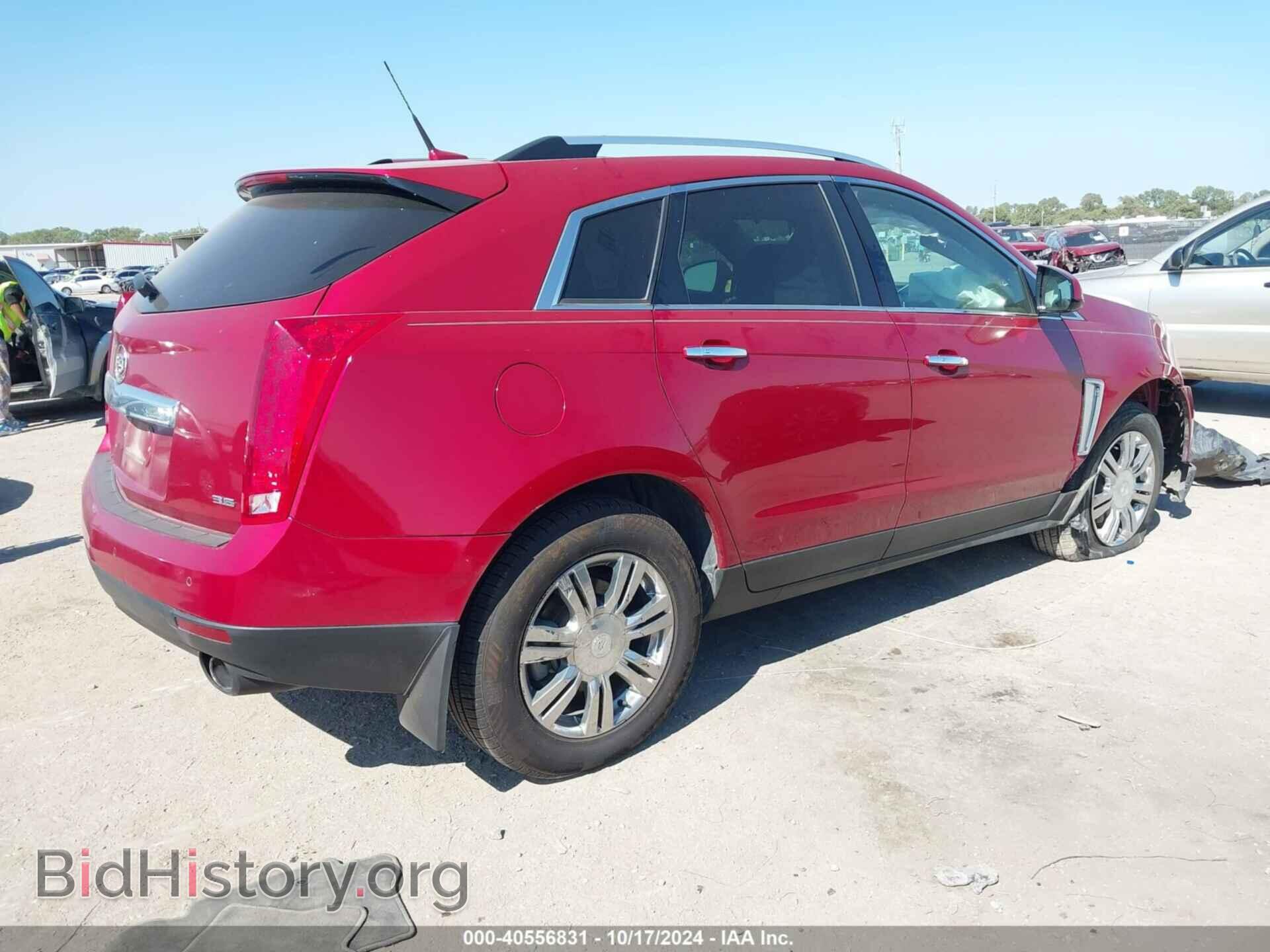 2014 CADILLAC SRX - VIN: 3GYFNBE38ES639926 - Фото 4