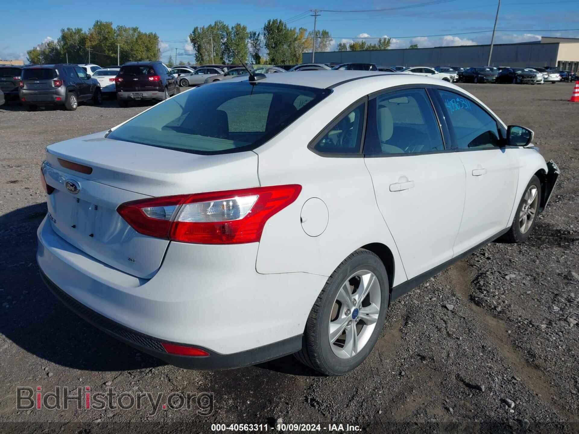 2014 FORD FOCUS - VIN: 1FADP3F2XEL448605 - Фото 4