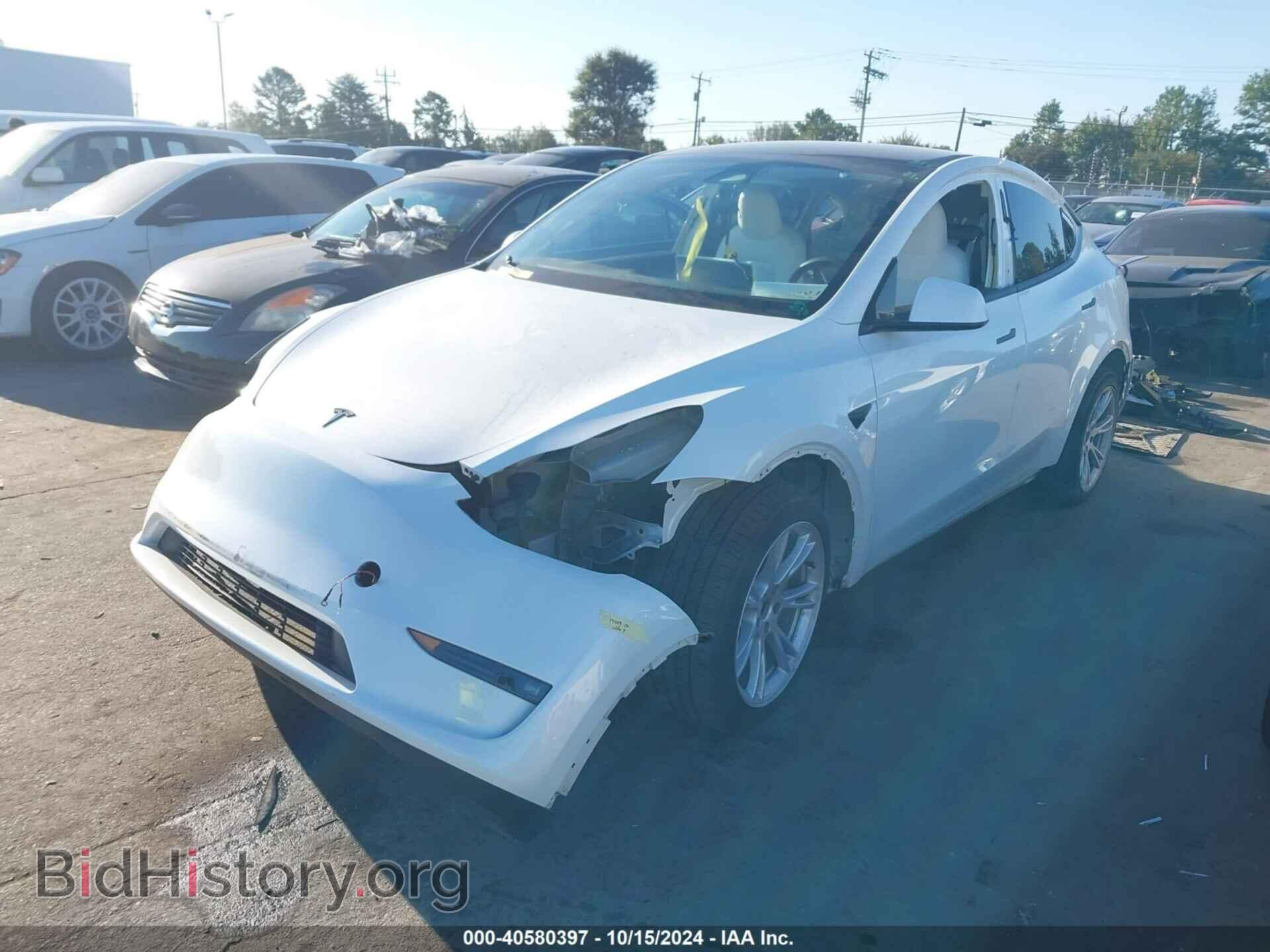 2023 TESLA MODEL Y - VIN: 7SAYGAEE2PF688882 - Фото 2