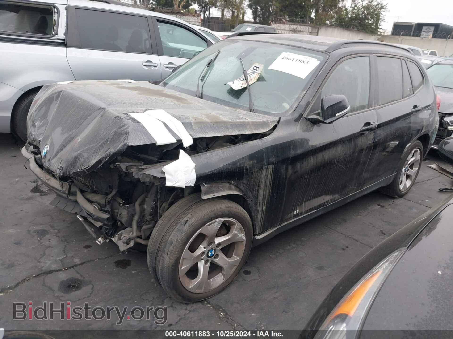 2014 BMW X1 - VIN: WBAVM1C55EVW49999 - Фото 2