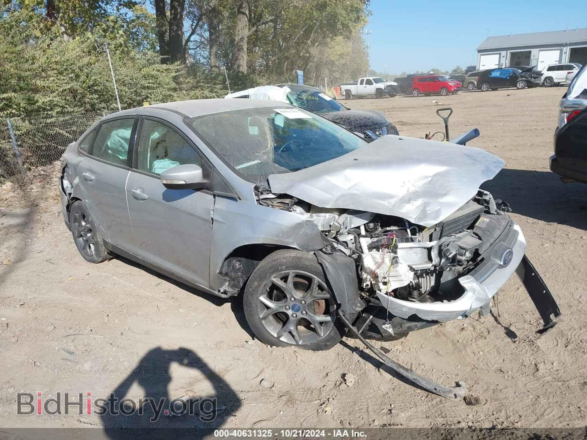 Фотография 1FADP3F27EL107372 - FORD FOCUS 2014