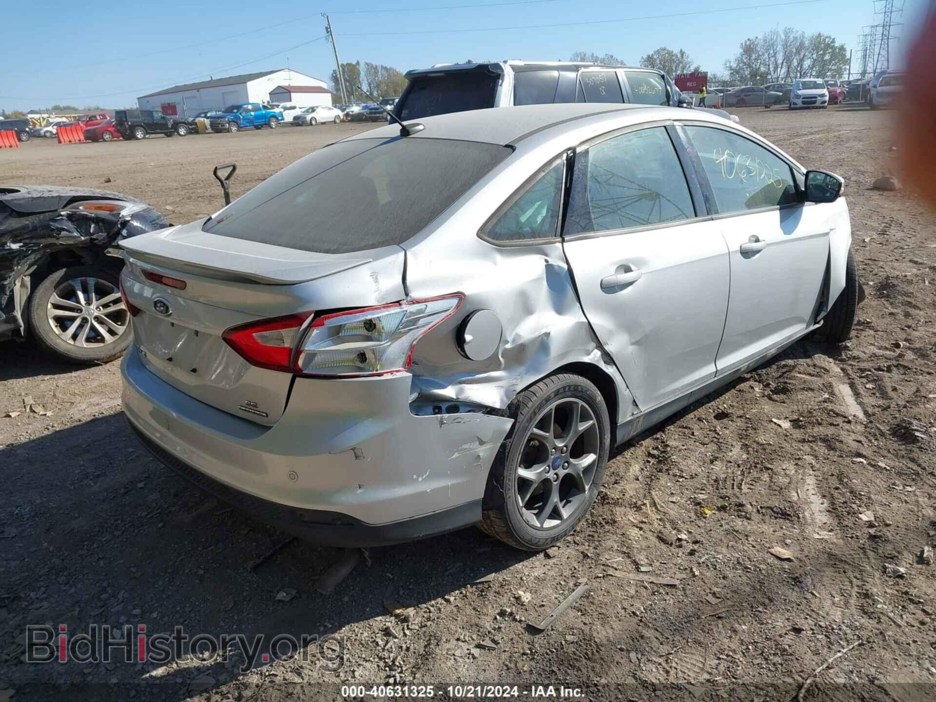 2014 FORD FOCUS - VIN: 1FADP3F27EL107372 - Photo 4