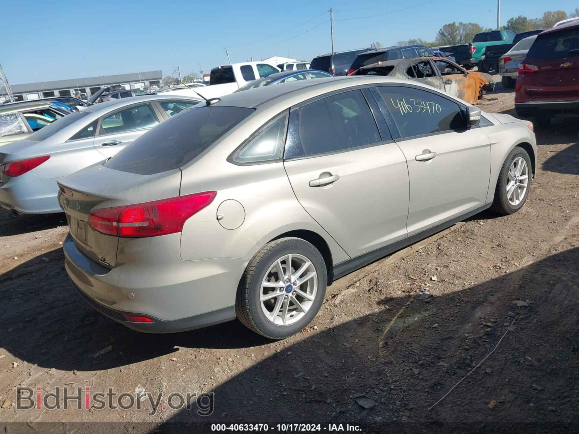 2015 FORD FOCUS - VIN: 1FADP3F22FL293131 - Photo 4