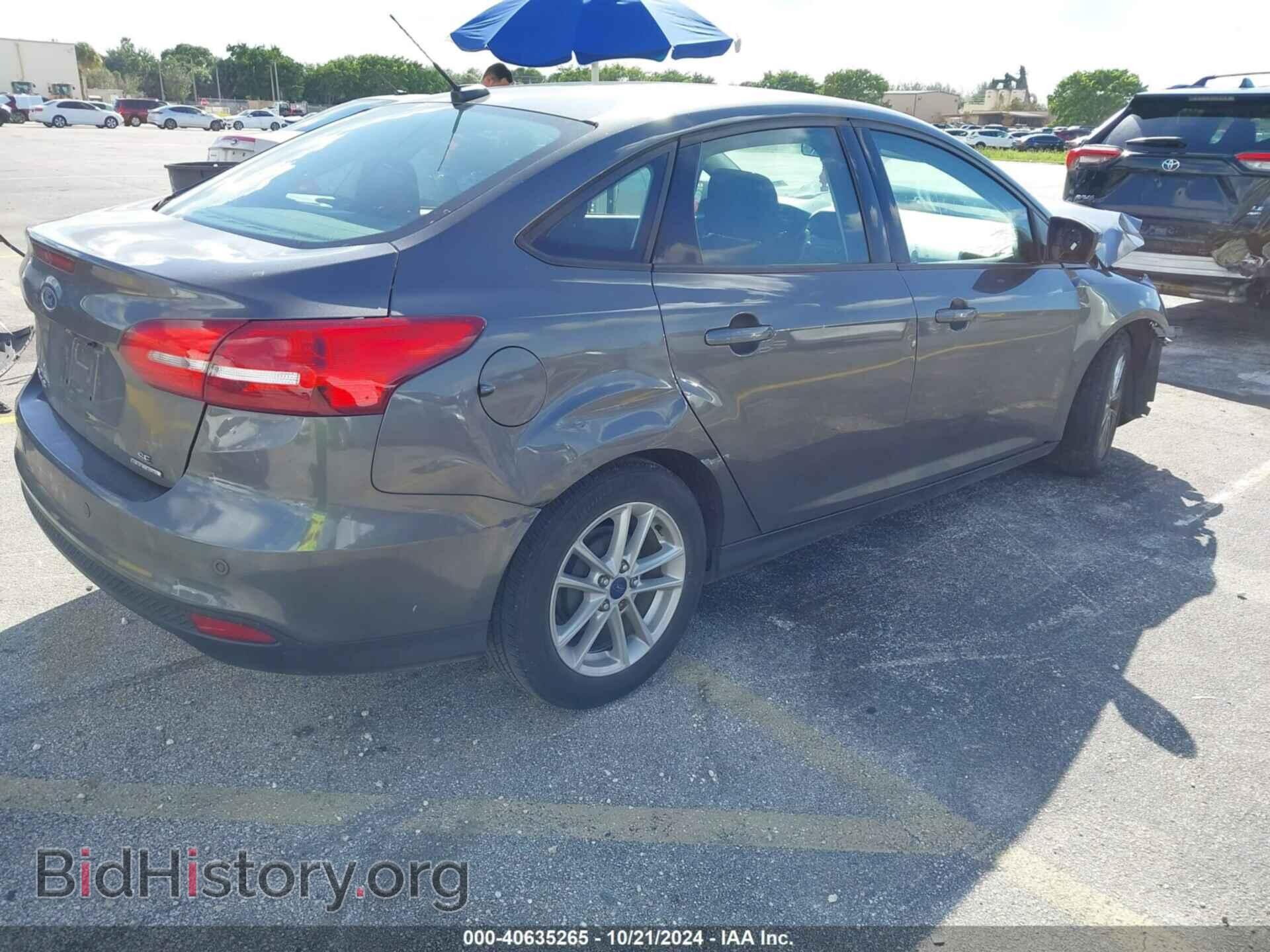 2015 FORD FOCUS - VIN: 1FADP3F29FL200606 - Photo 4