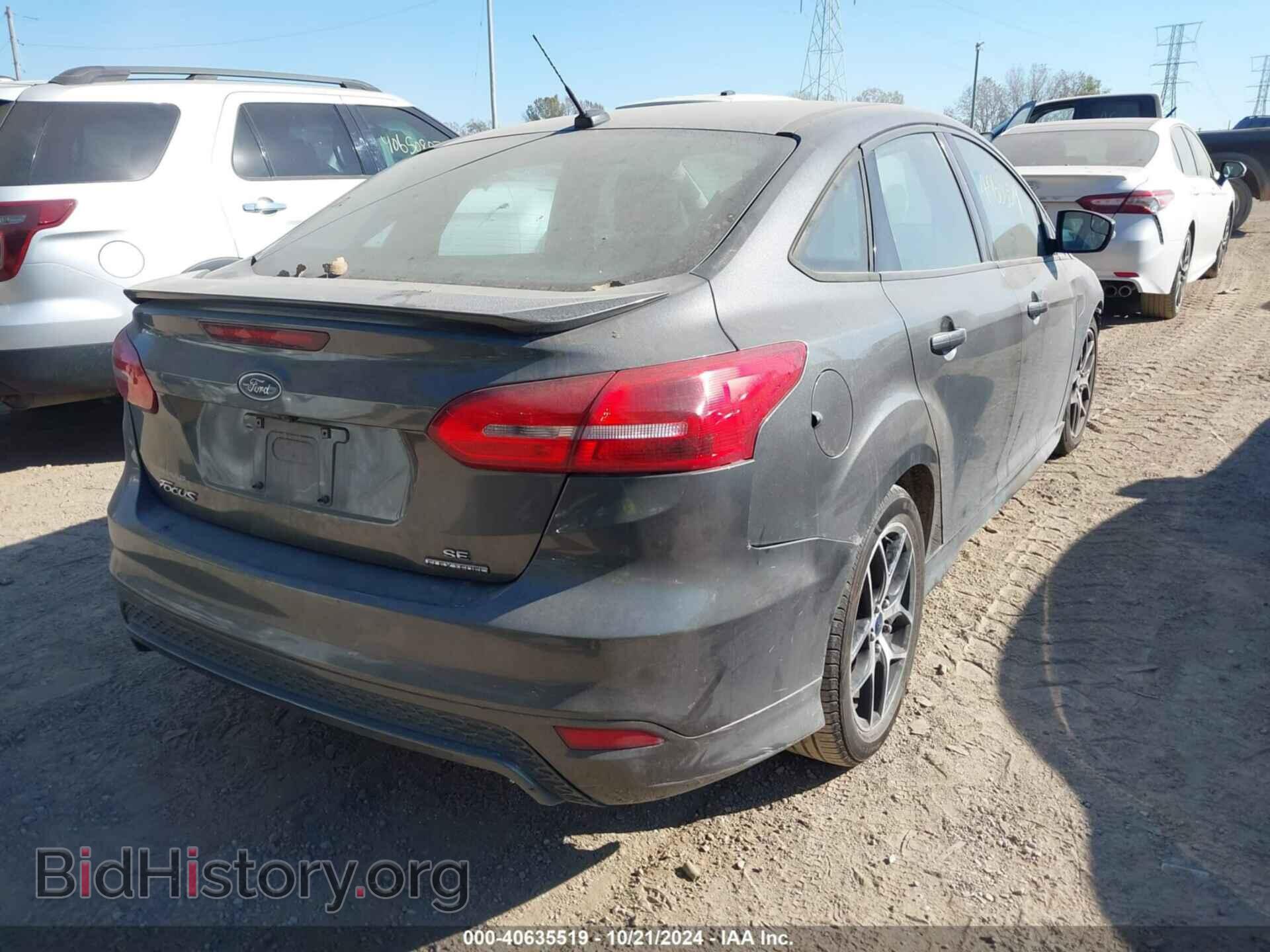 2015 FORD FOCUS - VIN: 1FADP3F22FL340030 - Photo 4