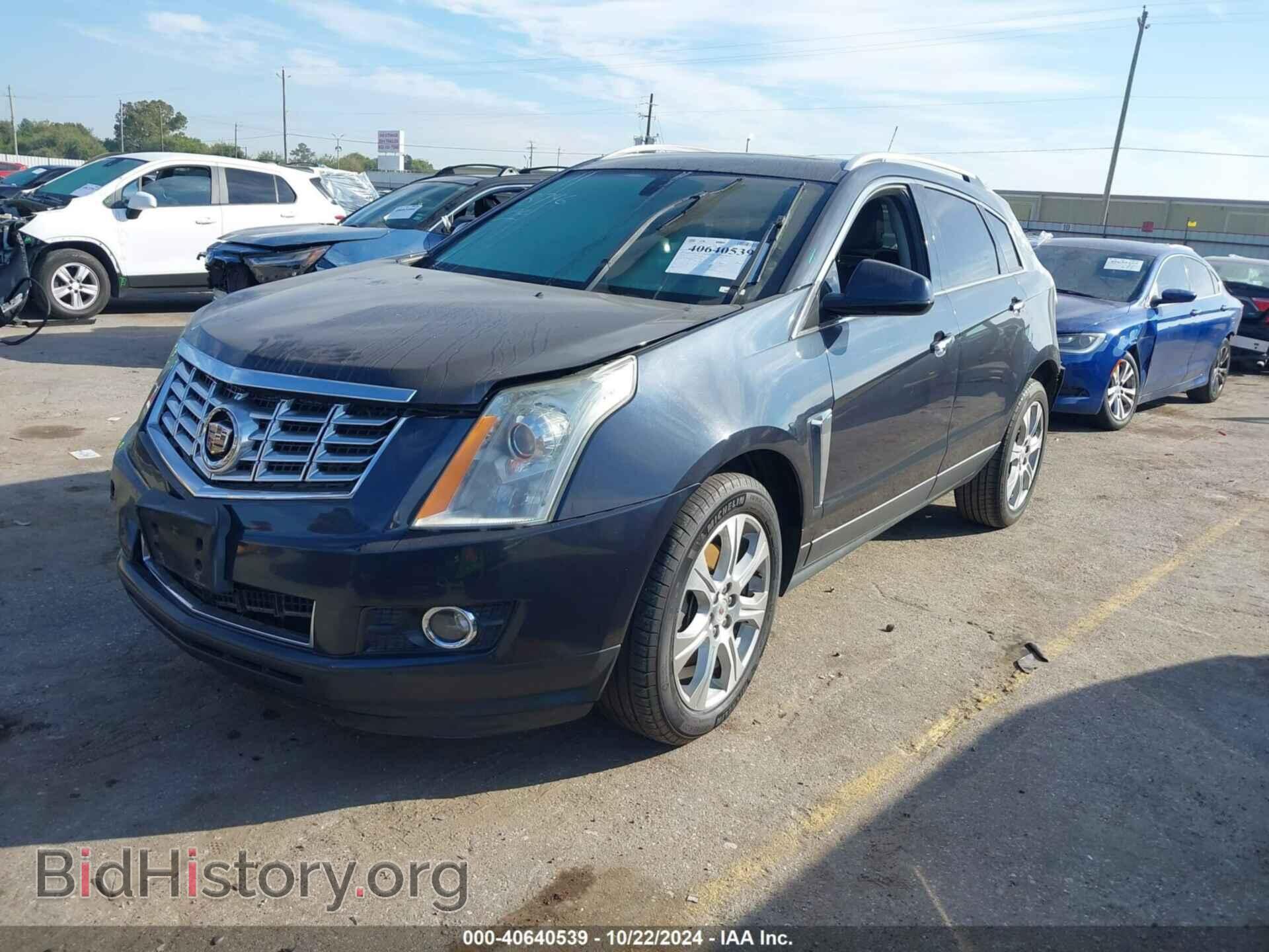 2016 CADILLAC SRX - VIN: 3GYFNCE31GS582767 - Фото 2