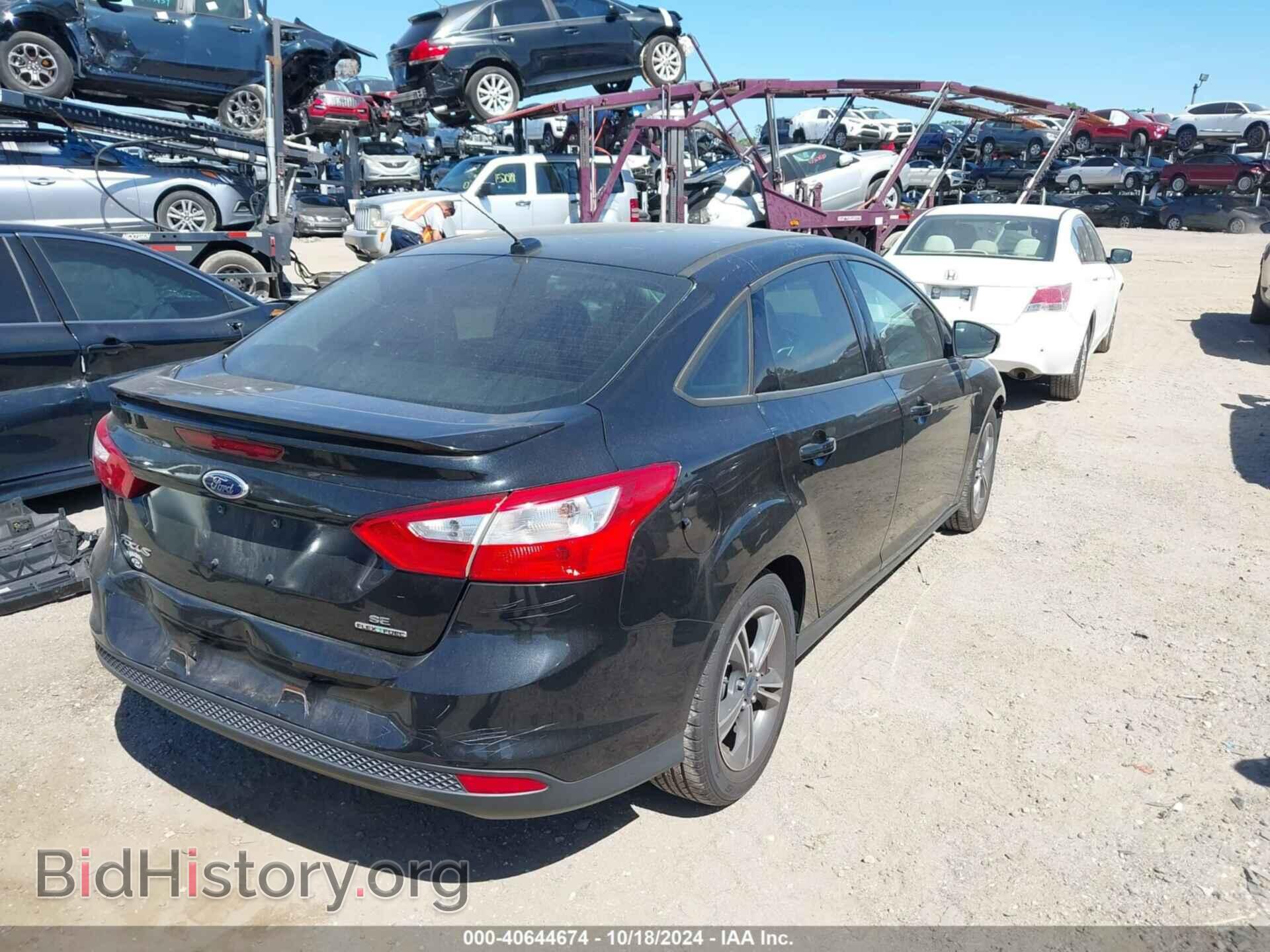 2014 FORD FOCUS - VIN: 1FADP3F27EL222277 - Photo 4